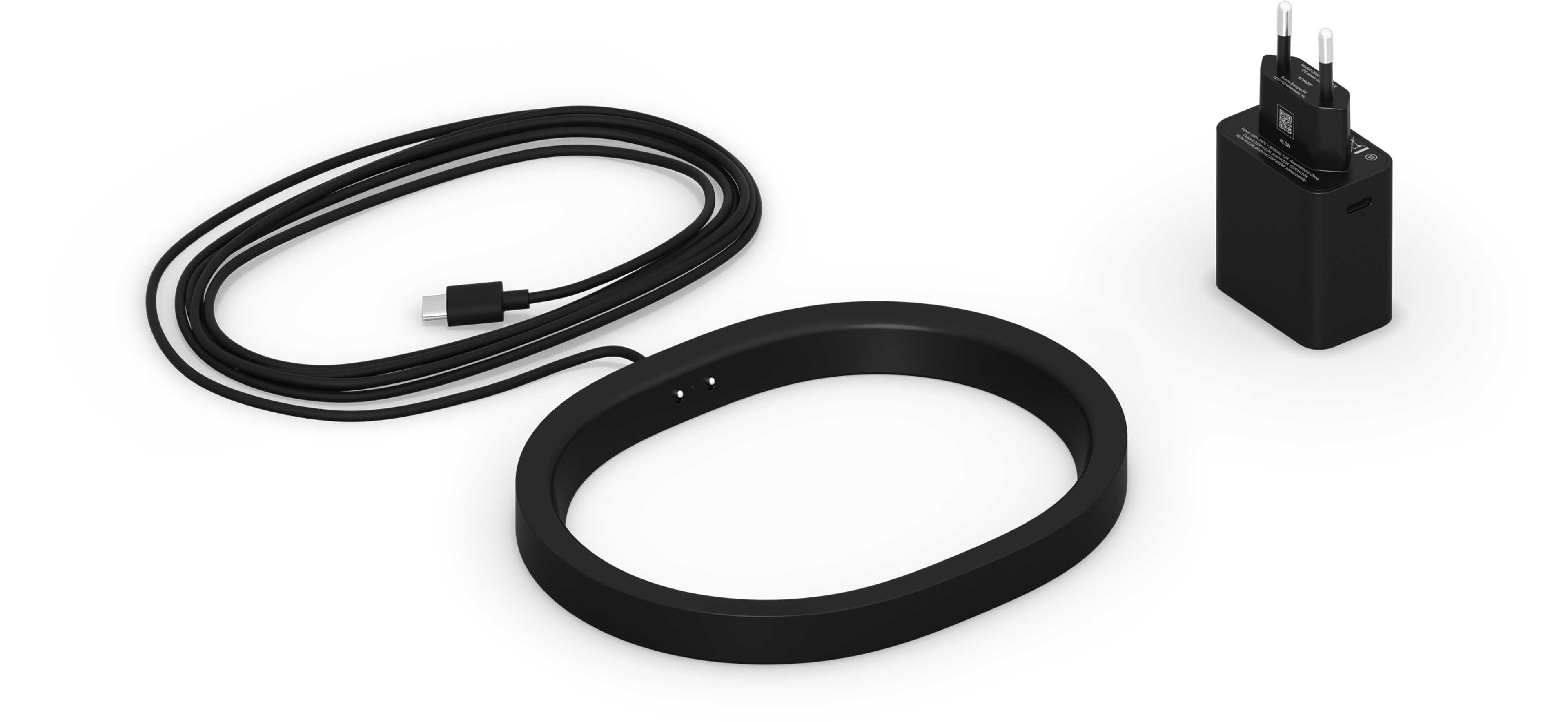 Image of the Move 2 Wireless Charging Base in black, with corresponding regional power plug