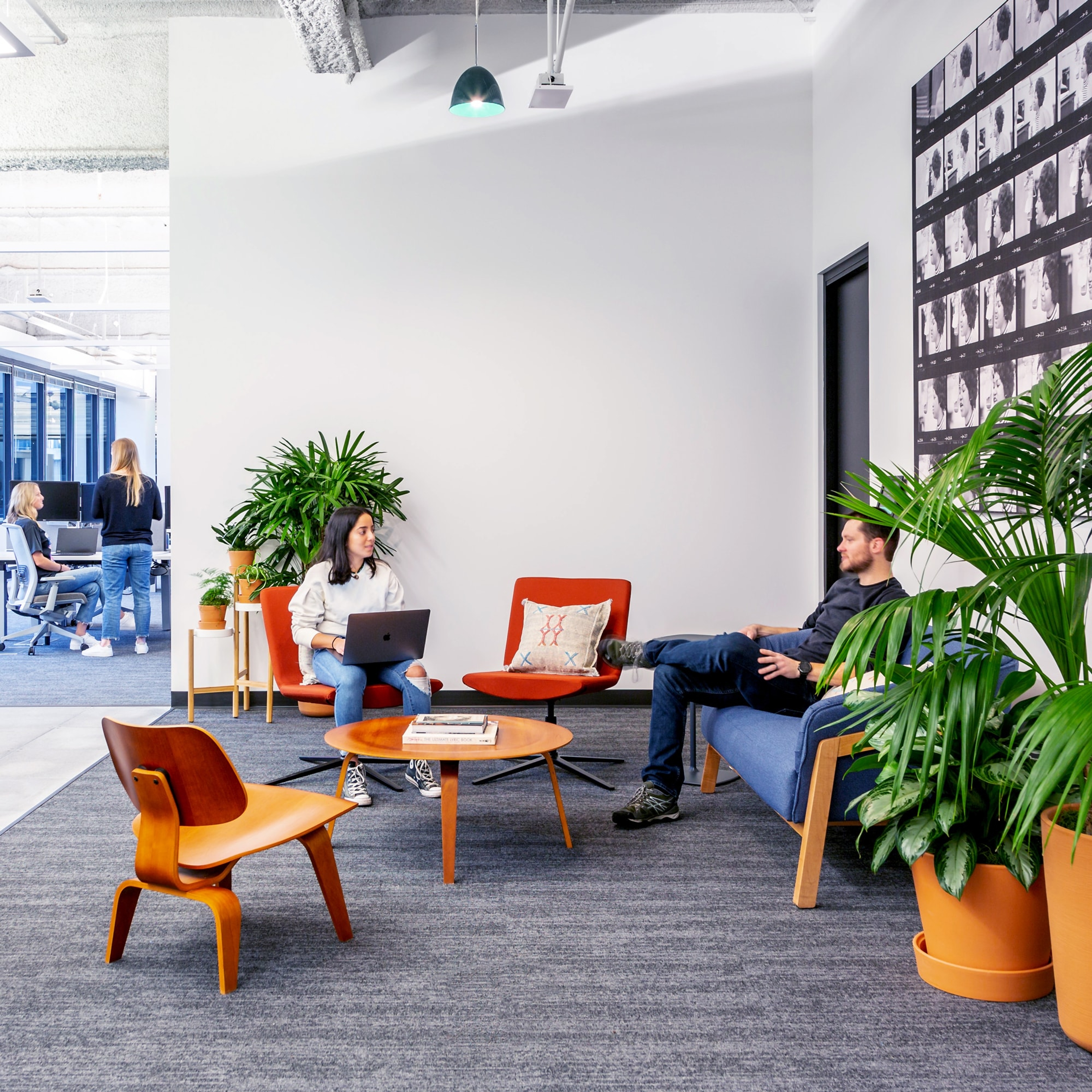 Sonos employees working and collaborating at the Sonos office