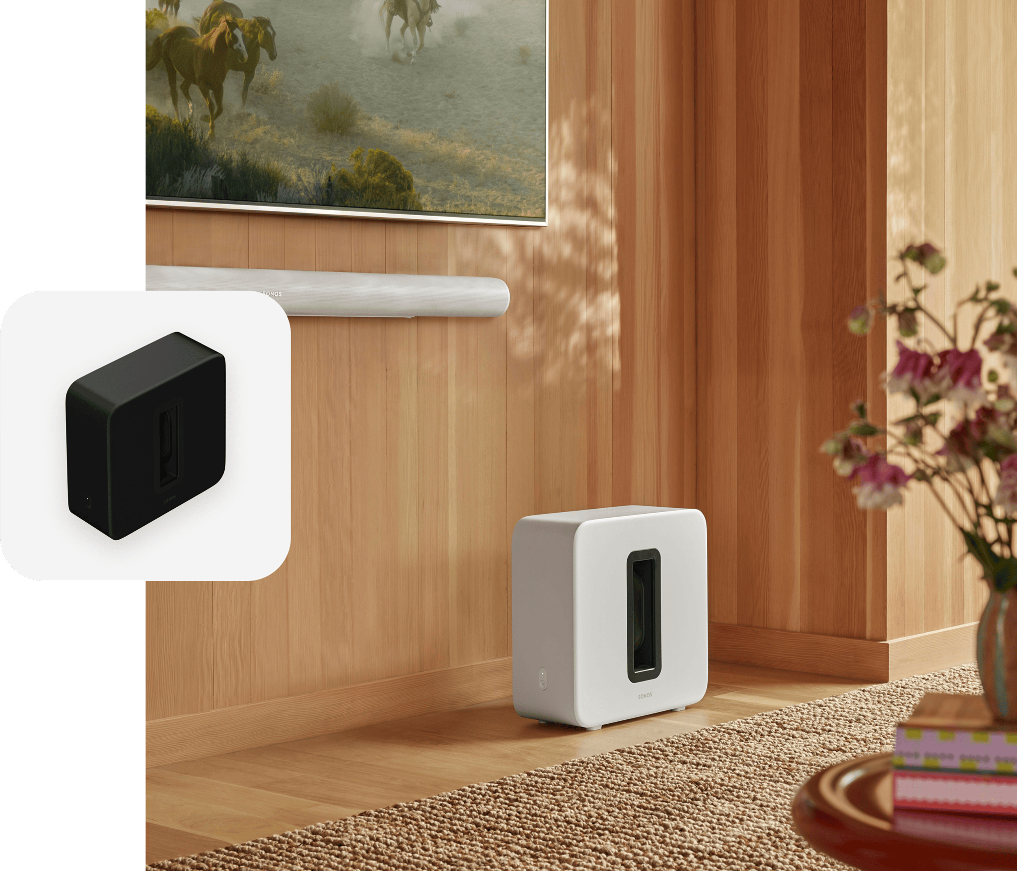 White Sonos Sub 4 and Arc Ultra in the living room with a black Sub 4 product tile overlay