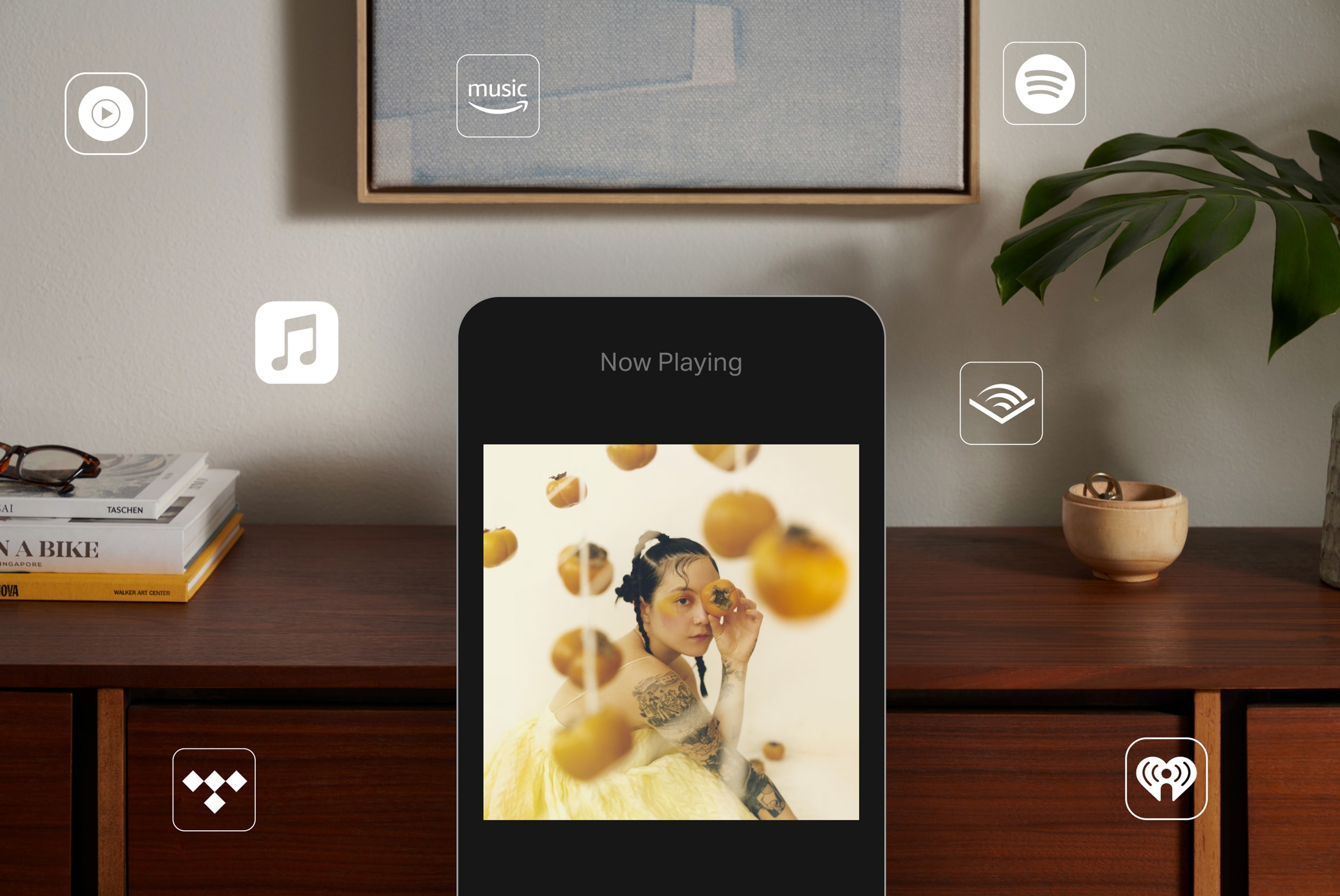Phone using Sonos app with various music streaming service logos