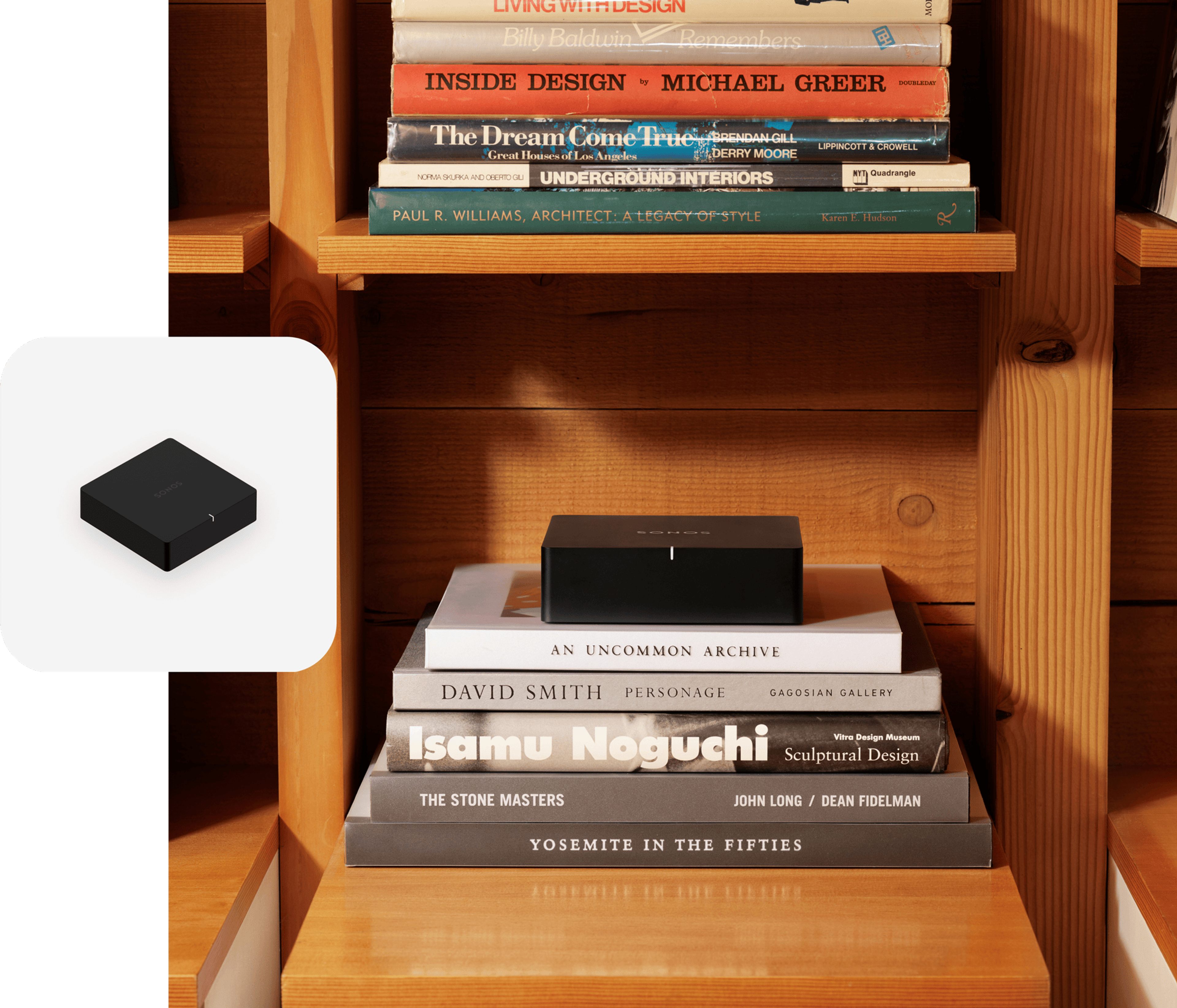 Black Sonos Pork on top of books with a black Port product tile overlay