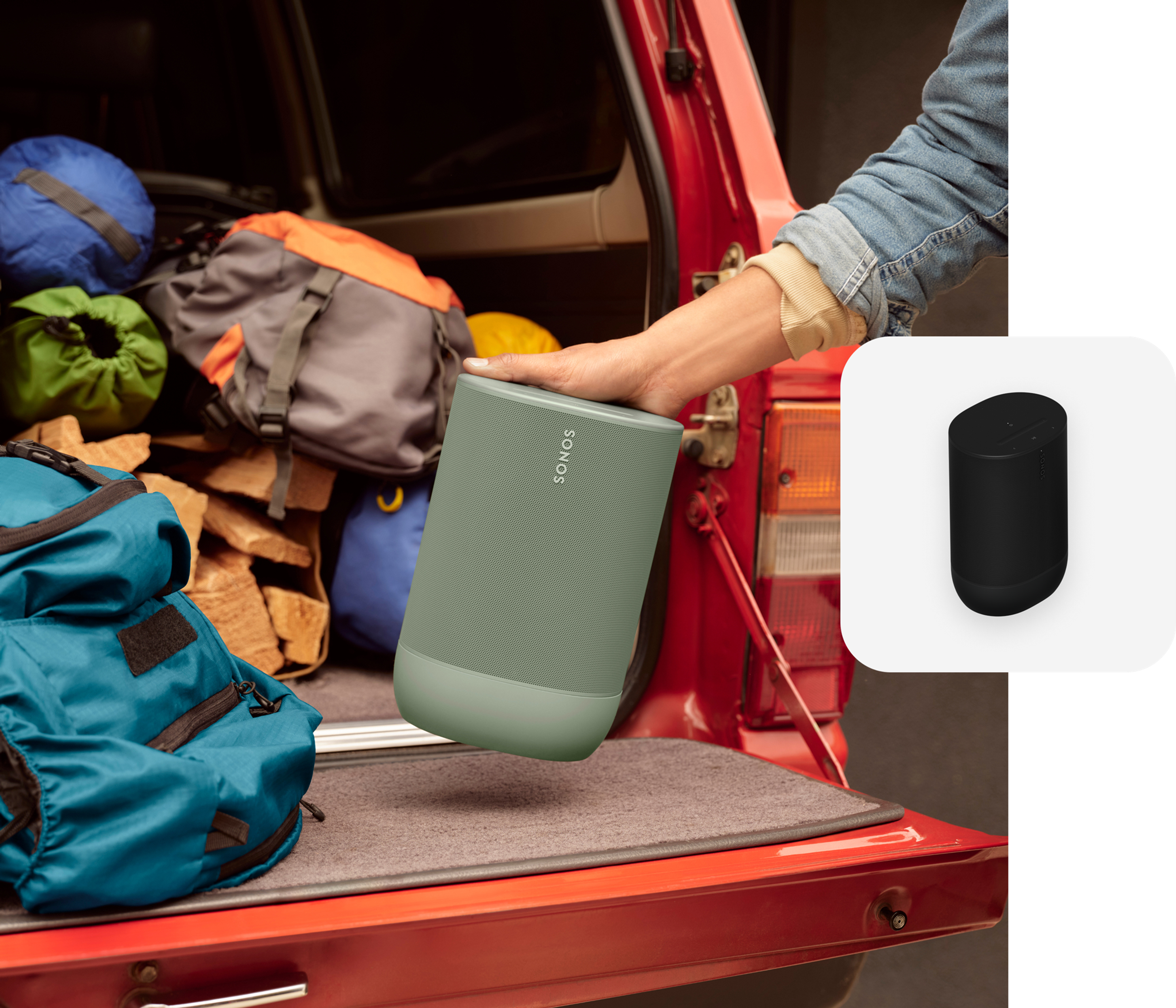 User loading up an olive-coloured Move 2 in the back of a truck for a camping trip