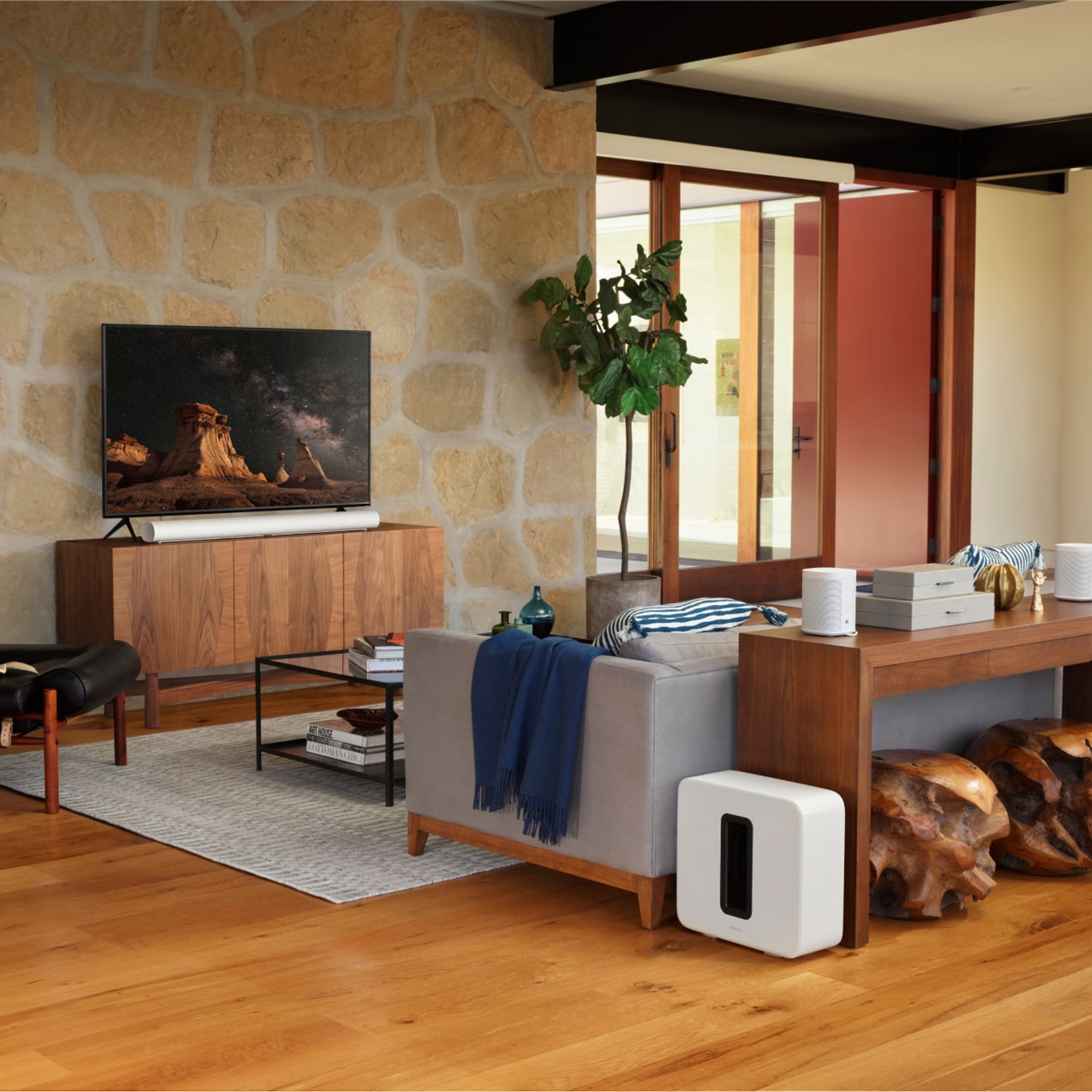 White Sonos home theatre system with Arc in living room