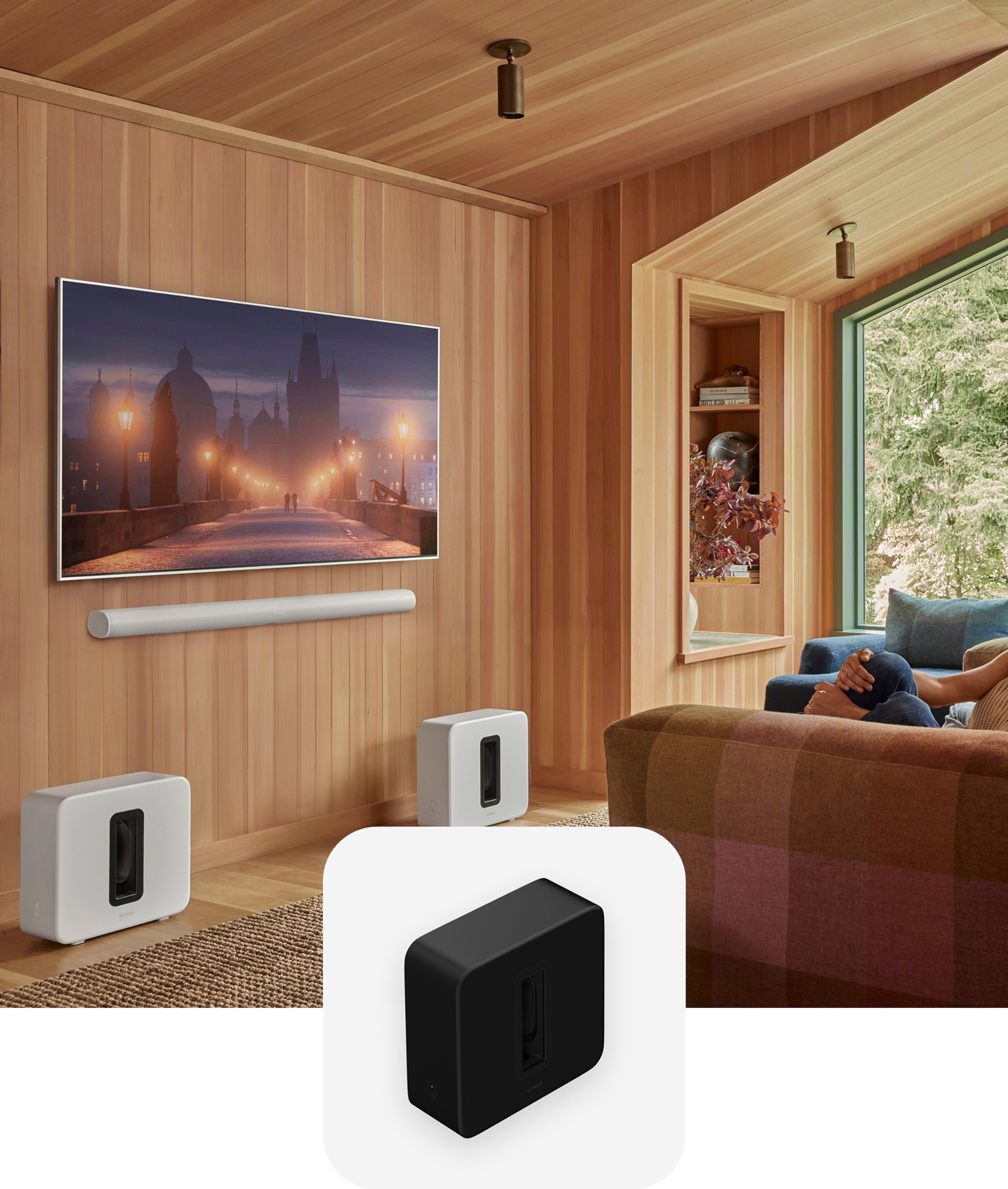 Dual white Sonos Sub 4 and Arc Ultra with a TV and a black Sub 4 product tile overlay