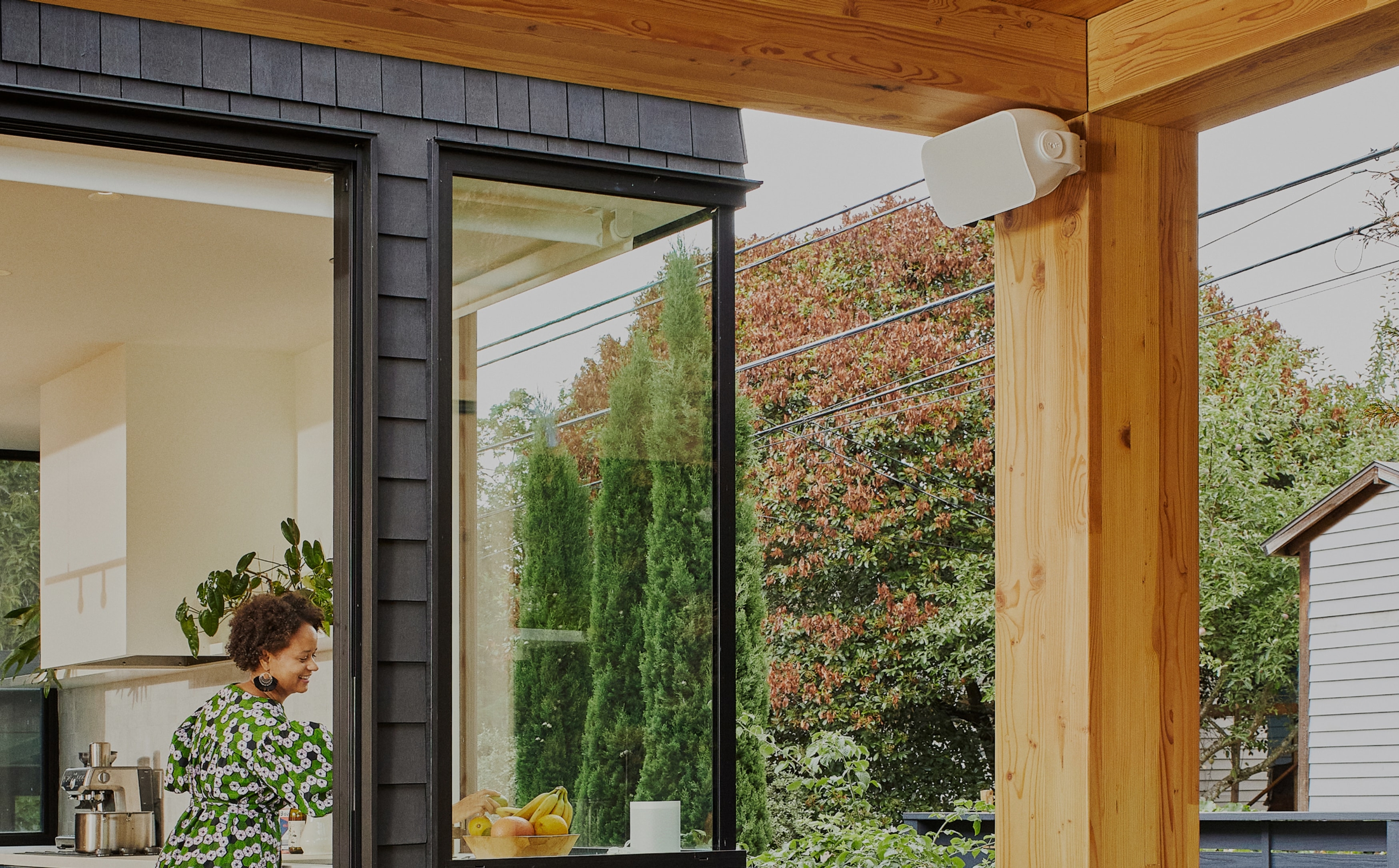 Sonos and Sonance Outdoor speaker installed under awning of outdoor patio