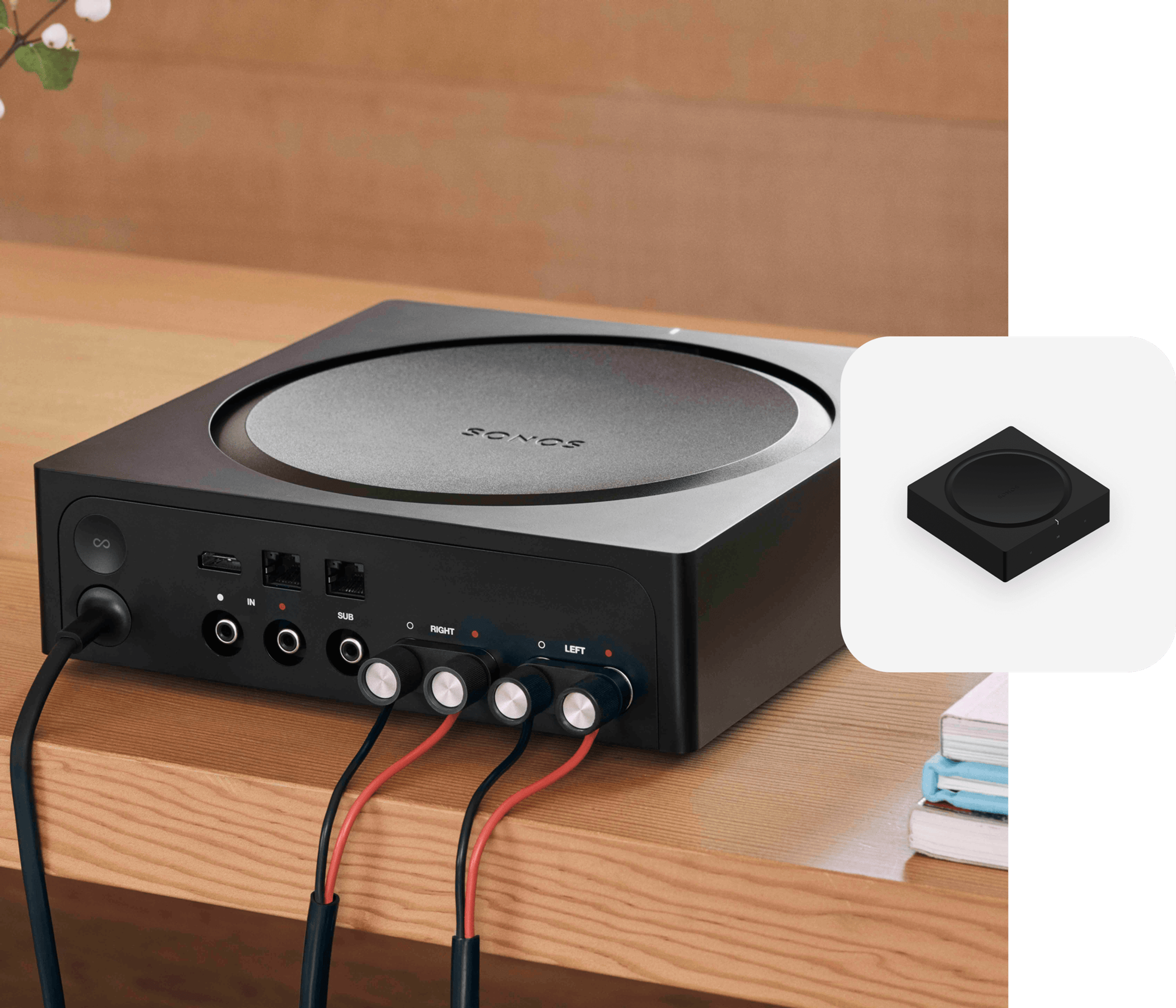 The back of a Sonos Amp with power and speaker wires connected