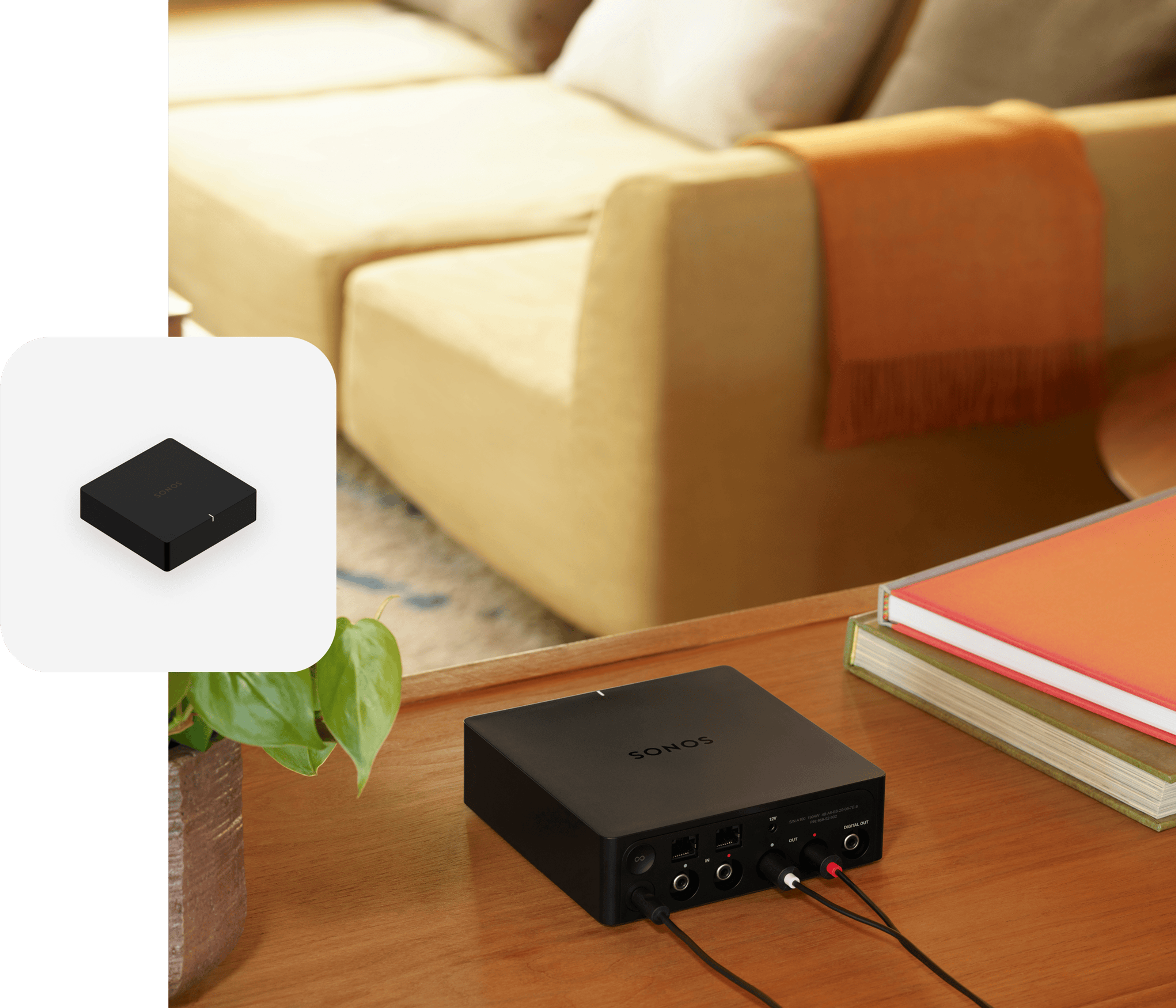 Black Sonos Port on a console table next to books with a black Port product tile overlay