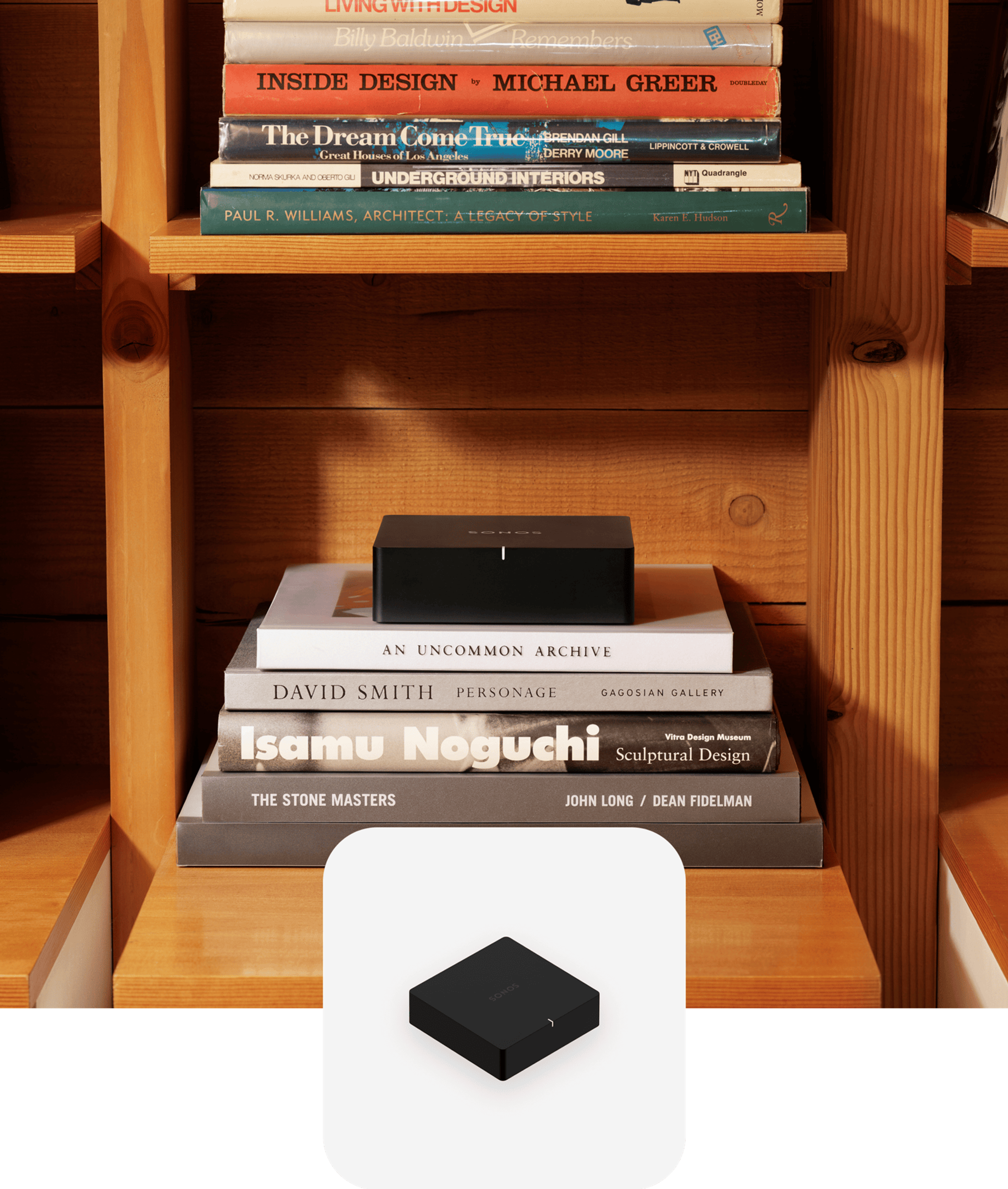 Black Sonos Pork on top of books with a black Port product tile overlay