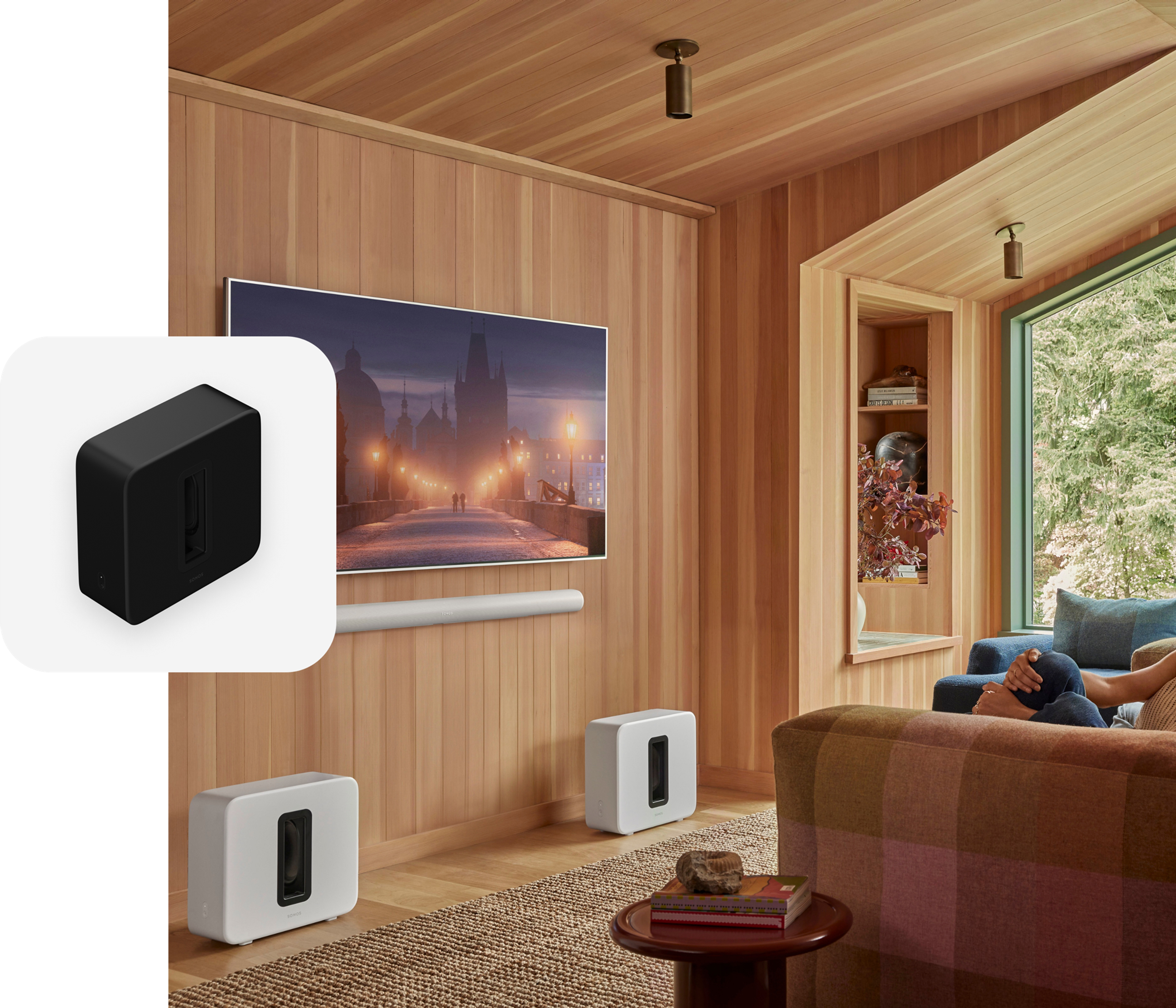 Dual white Sonos Sub 4 and Arc Ultra with a TV and a black Sub 4 product tile overlay