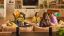 Three people gathered in a living room with a black Sonos Beam Ultra soundbar and a pair of Sonos Play in a modern living room