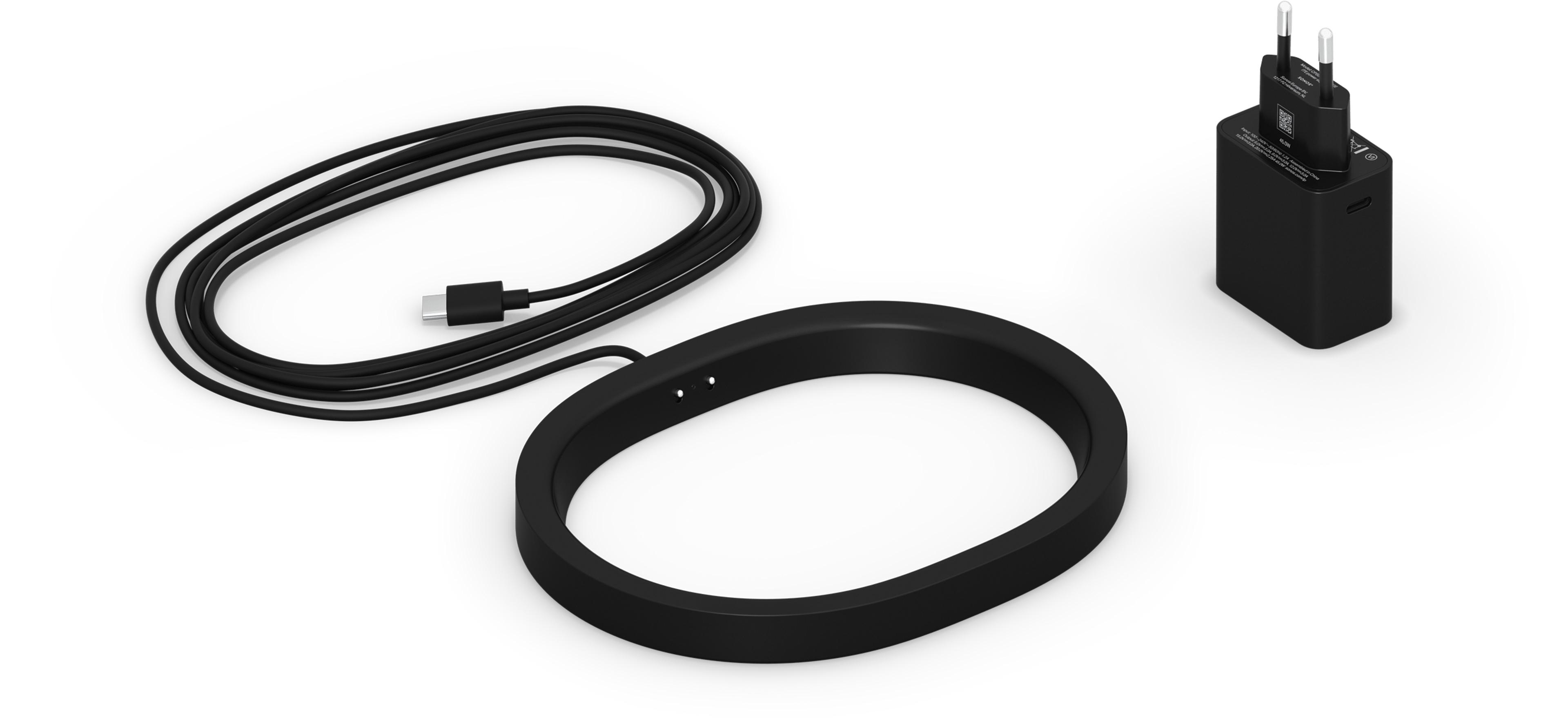 Bild einer kabellosen Ladestation für den Sonos Move 2 in Schwarz und einer regionalen Steckdose