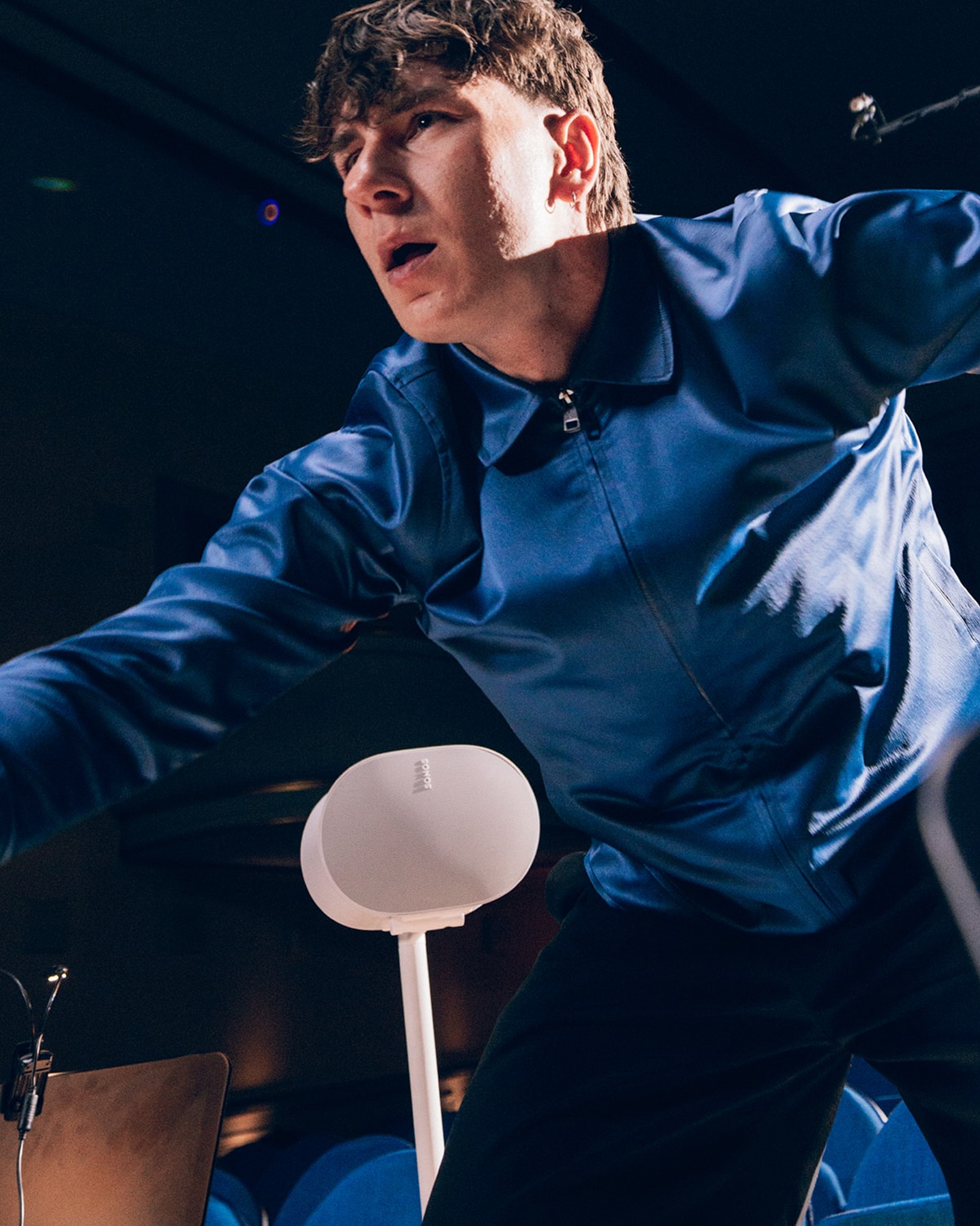 Musician and DJ Bunt with white Sonos Era 300 speaker in the background