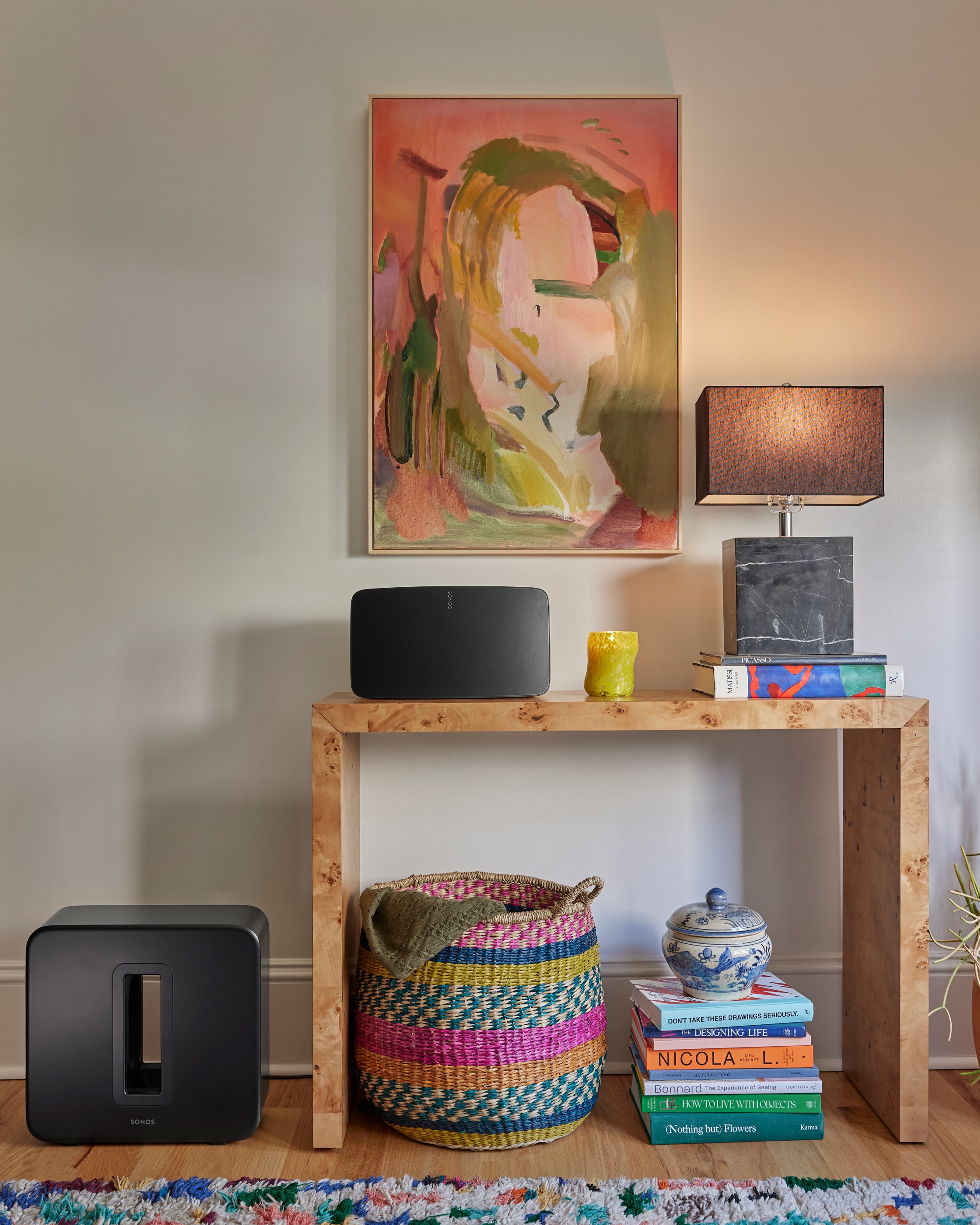 Sonos Sub 4 and Sonos Five on a console table