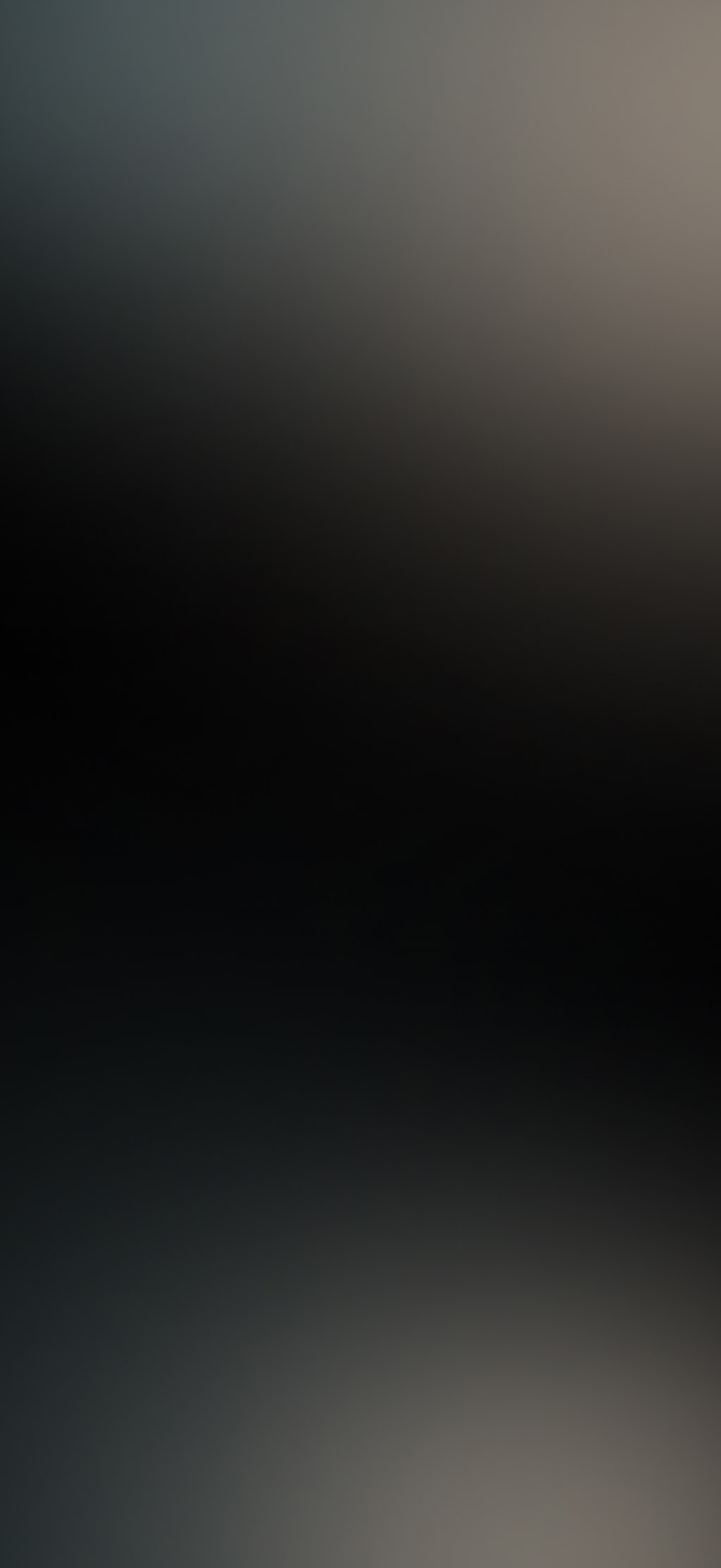 Tan and grey color gradients over a black background