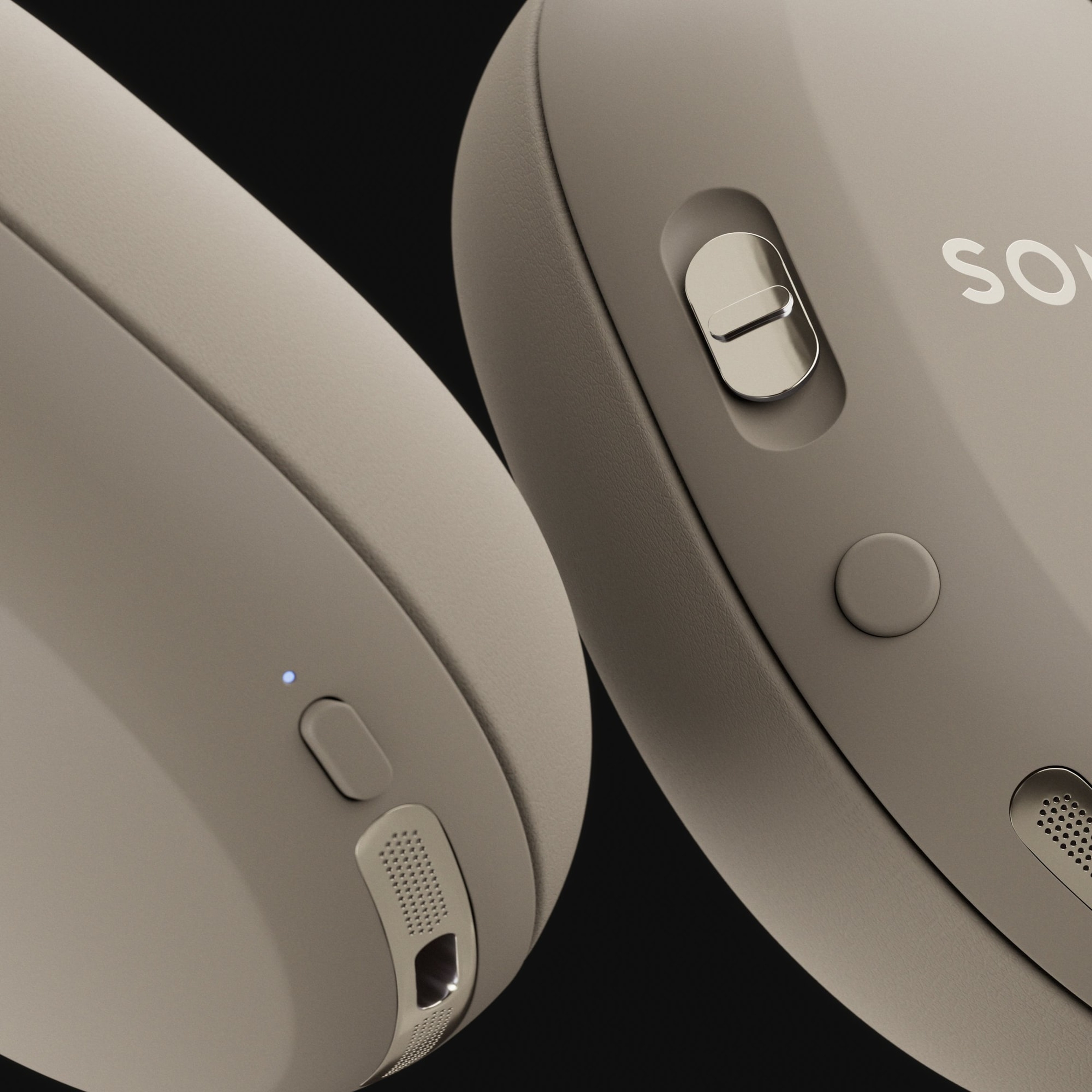 Closeup detail of the controls on a pair of Sonos Ace Ultra headphones in Sand