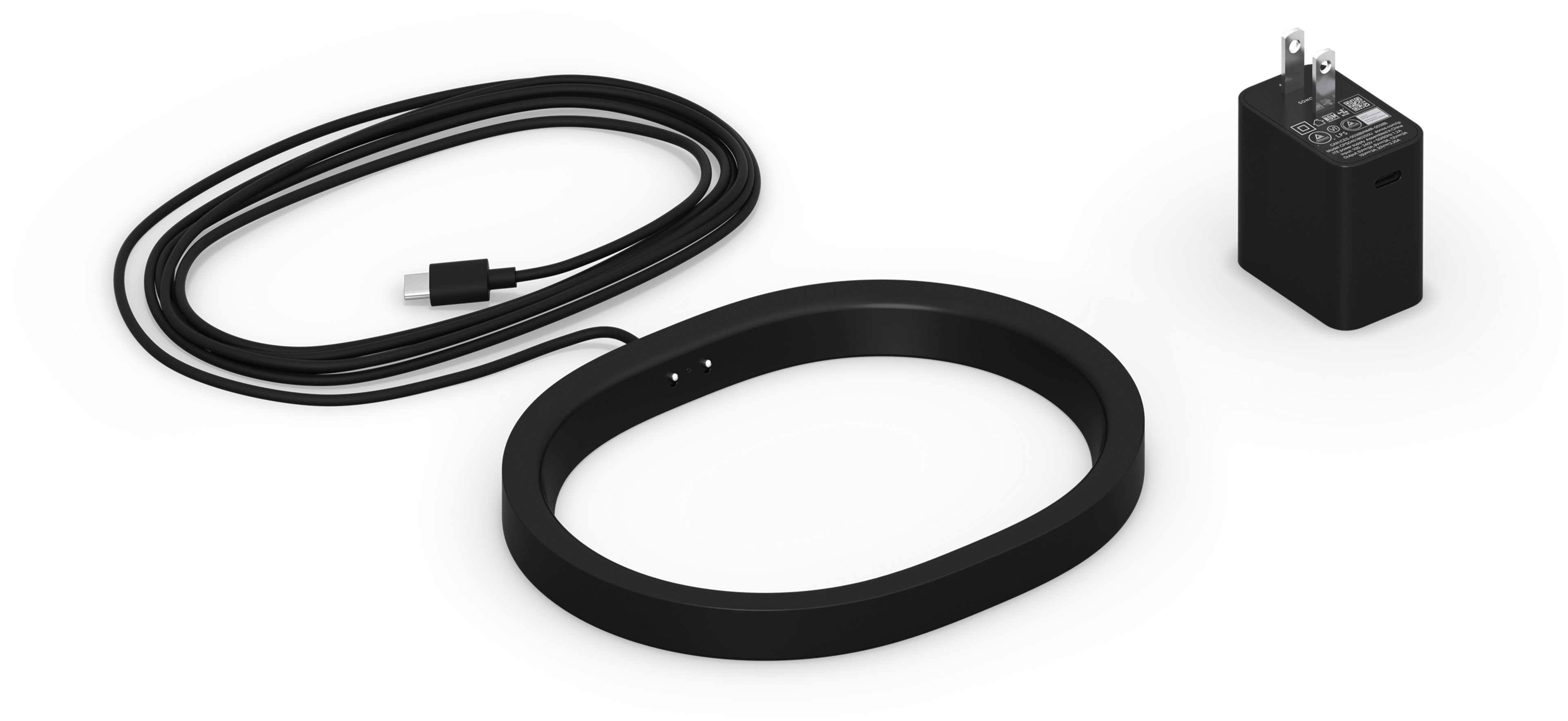 Image of the Move 2 Wireless Charging Base in black, with corresponding regional power plug