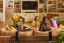 Friends in a living room with a Beam Ultra home cinema surround set with a pair of