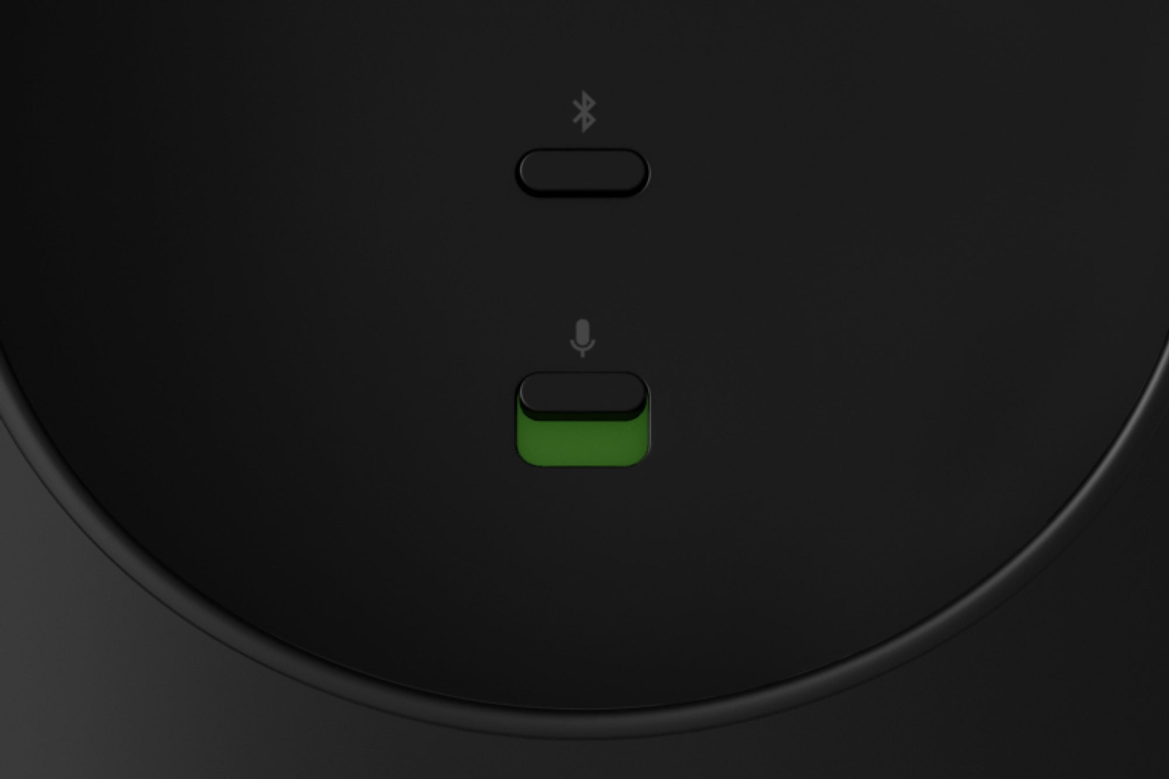 A closeup image of the back microphone toggle on a black Sonos Move 2