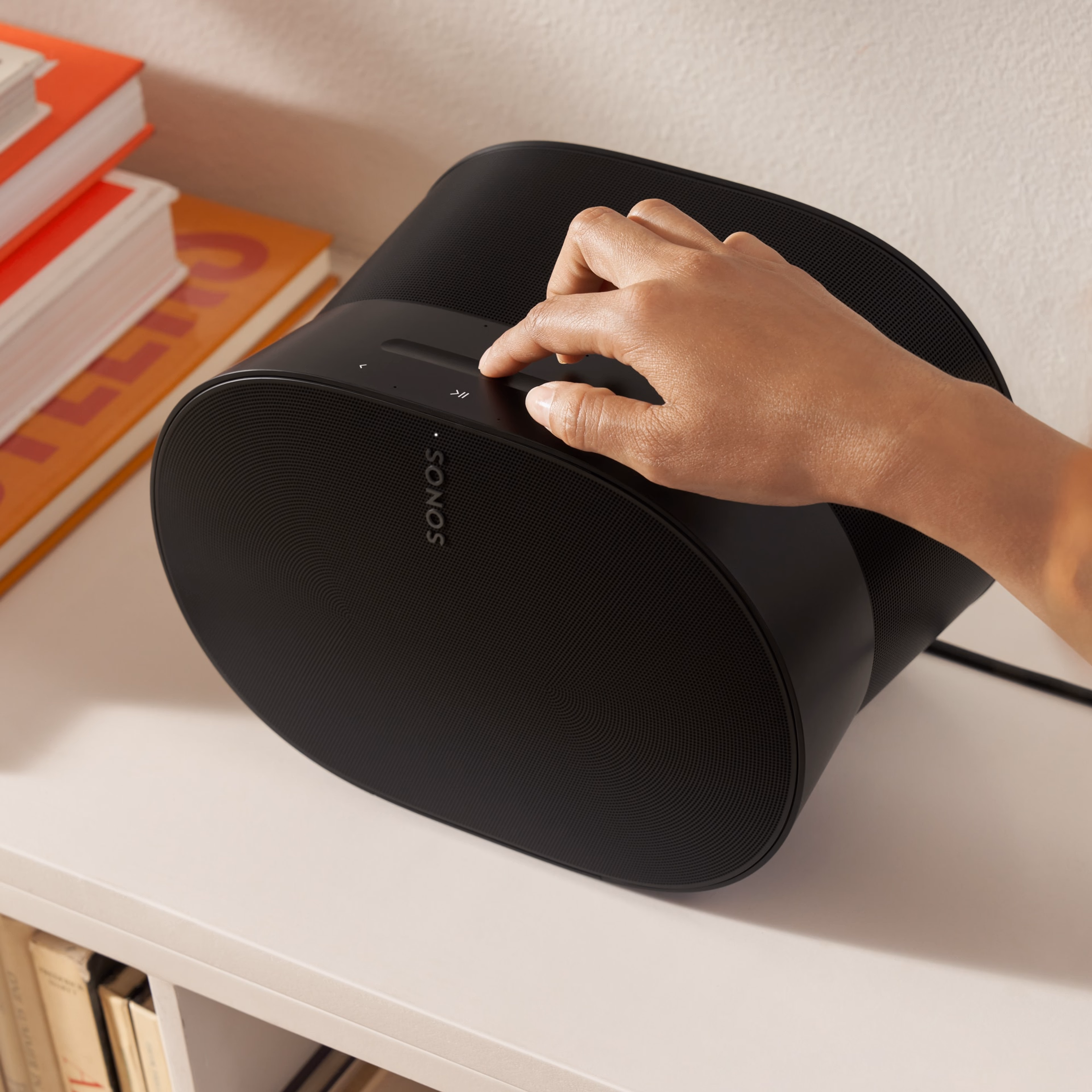 Easy-to-use touch controls on the top of a black Era 300 speaker