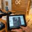 Tablet showing the Sonos Pro app at an Outerknown retail location