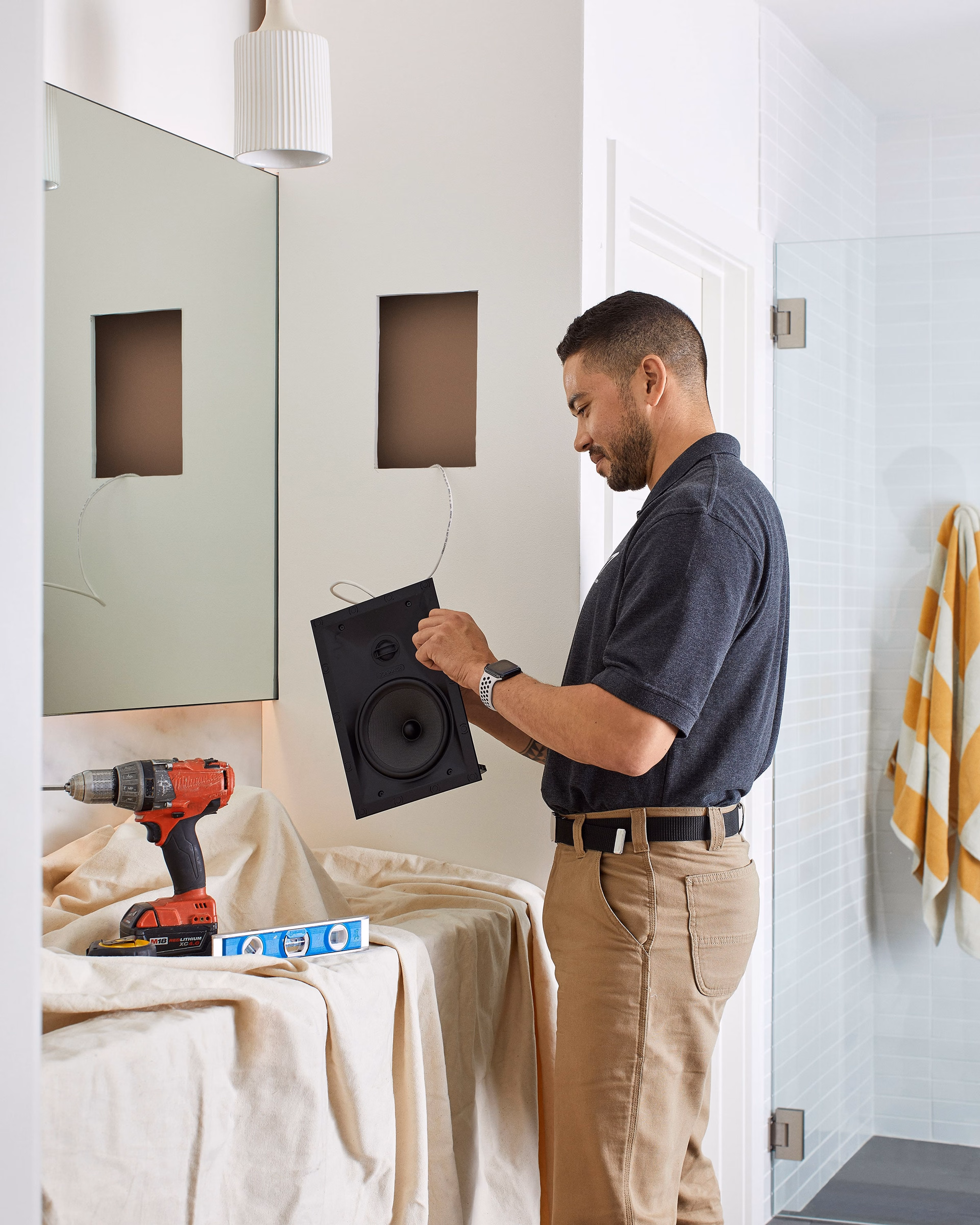 Professional installer installing Sonos and Sonance In-Wall speakers