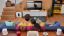 A couple watching TV with a Sonos Beam surround sound setup