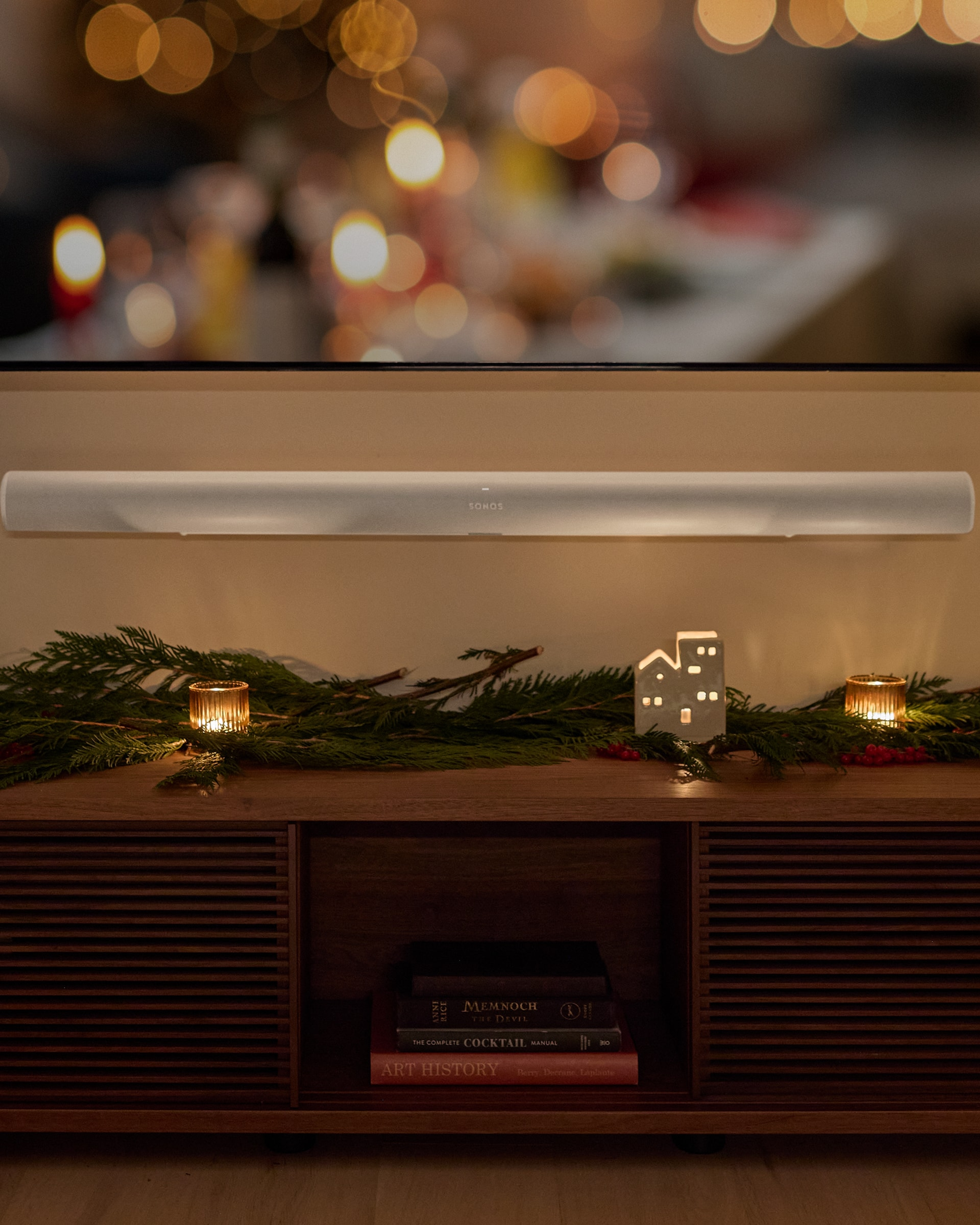 White Arc Ultra wall-mounted underneath a television