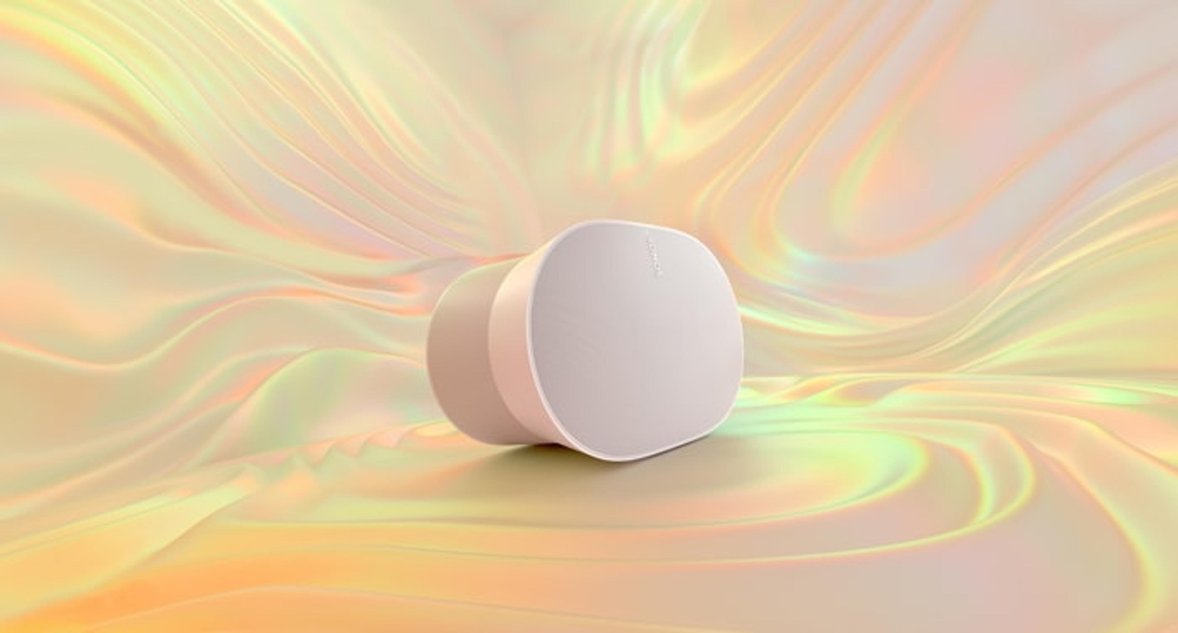 A white Sonos Era 300 on a multicolour gradient background