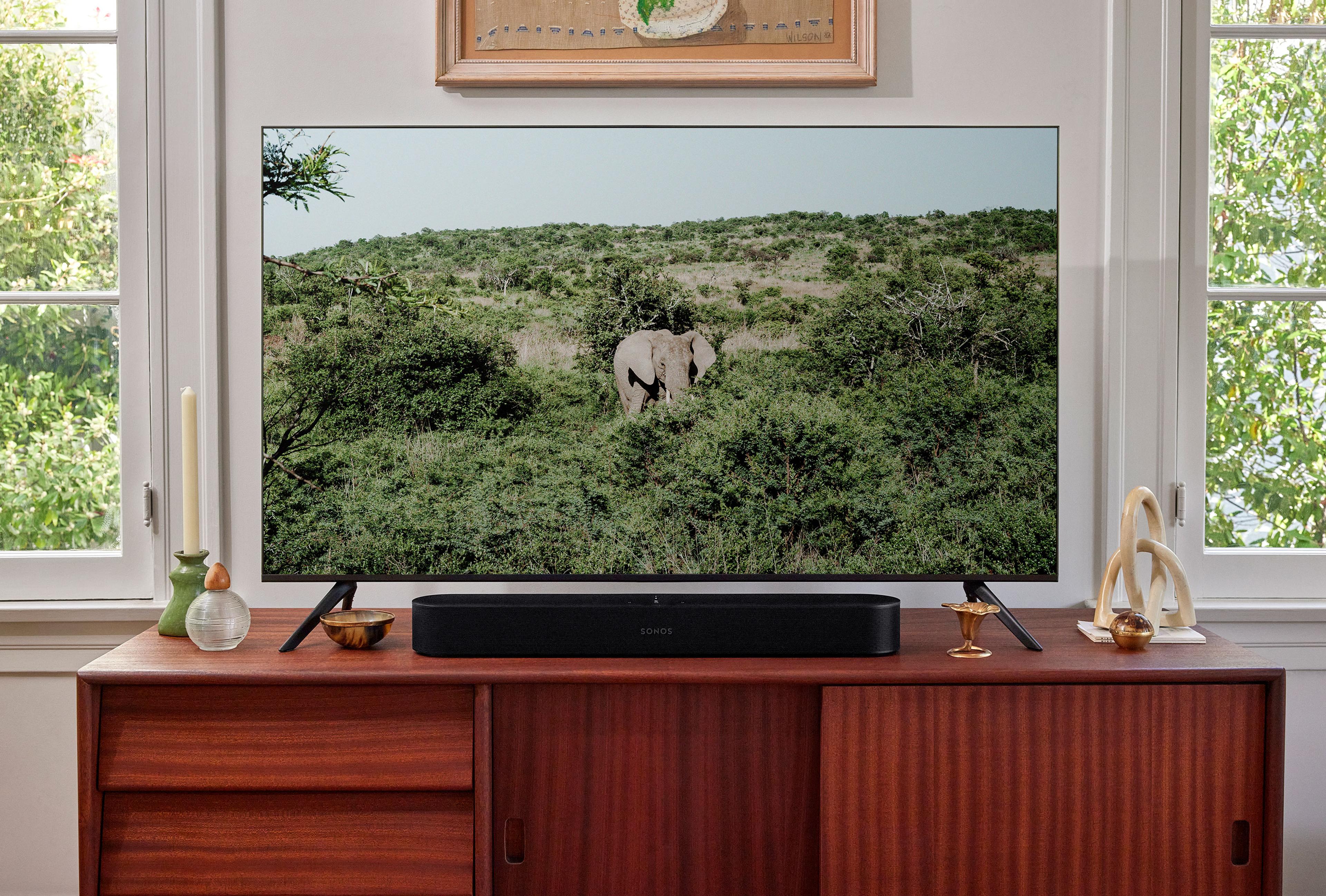 Black Beam TV on a cabinet