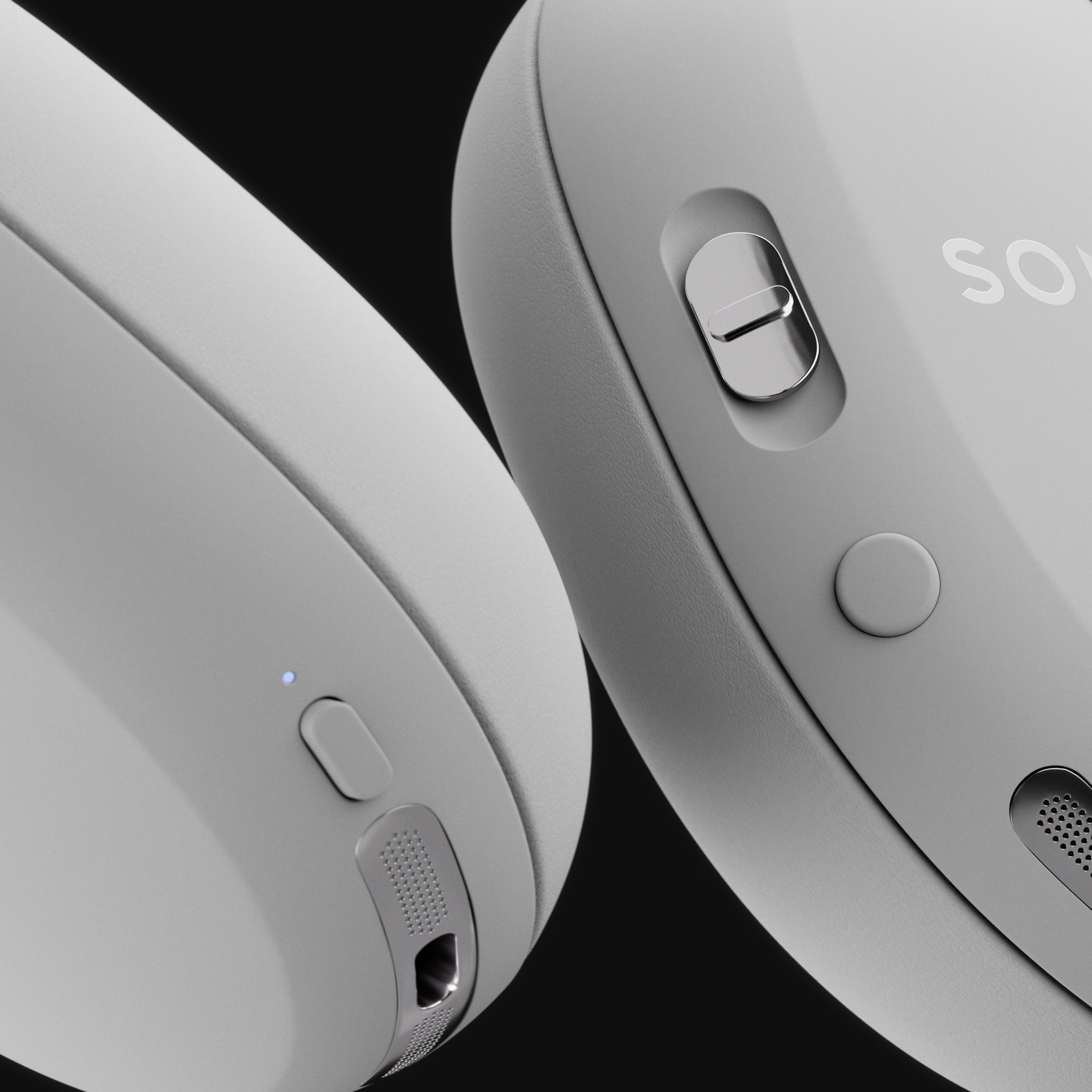 Close-up detail of the controls on a pair of Sonos Ace Ultra headphones in white