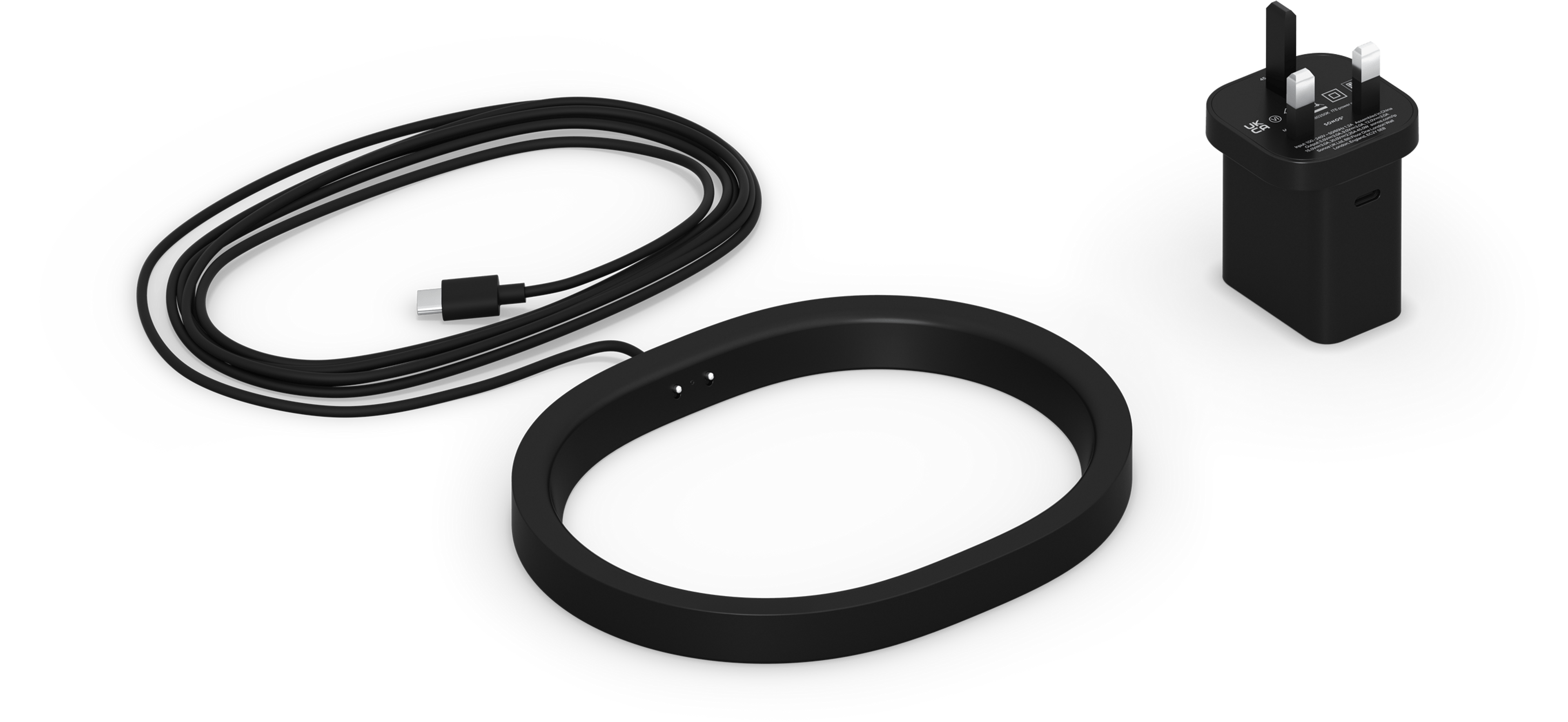 Image of the Move 2 Wireless Charging Base in black, with corresponding regional power plug