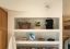 Sonos speaker wall mounted at an Outerknown retail location