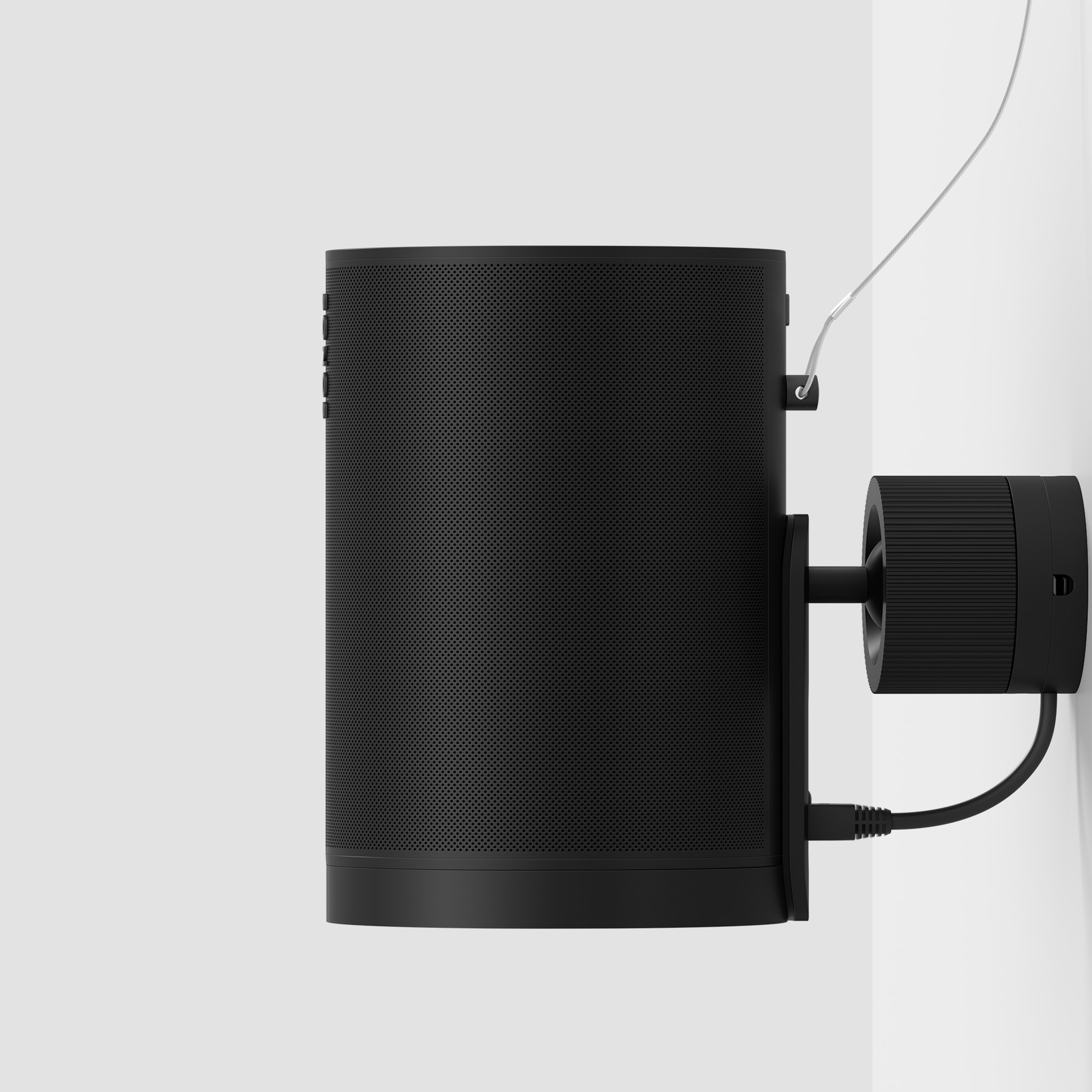 Sonos Era 100 Pro black side view mounted on a wall