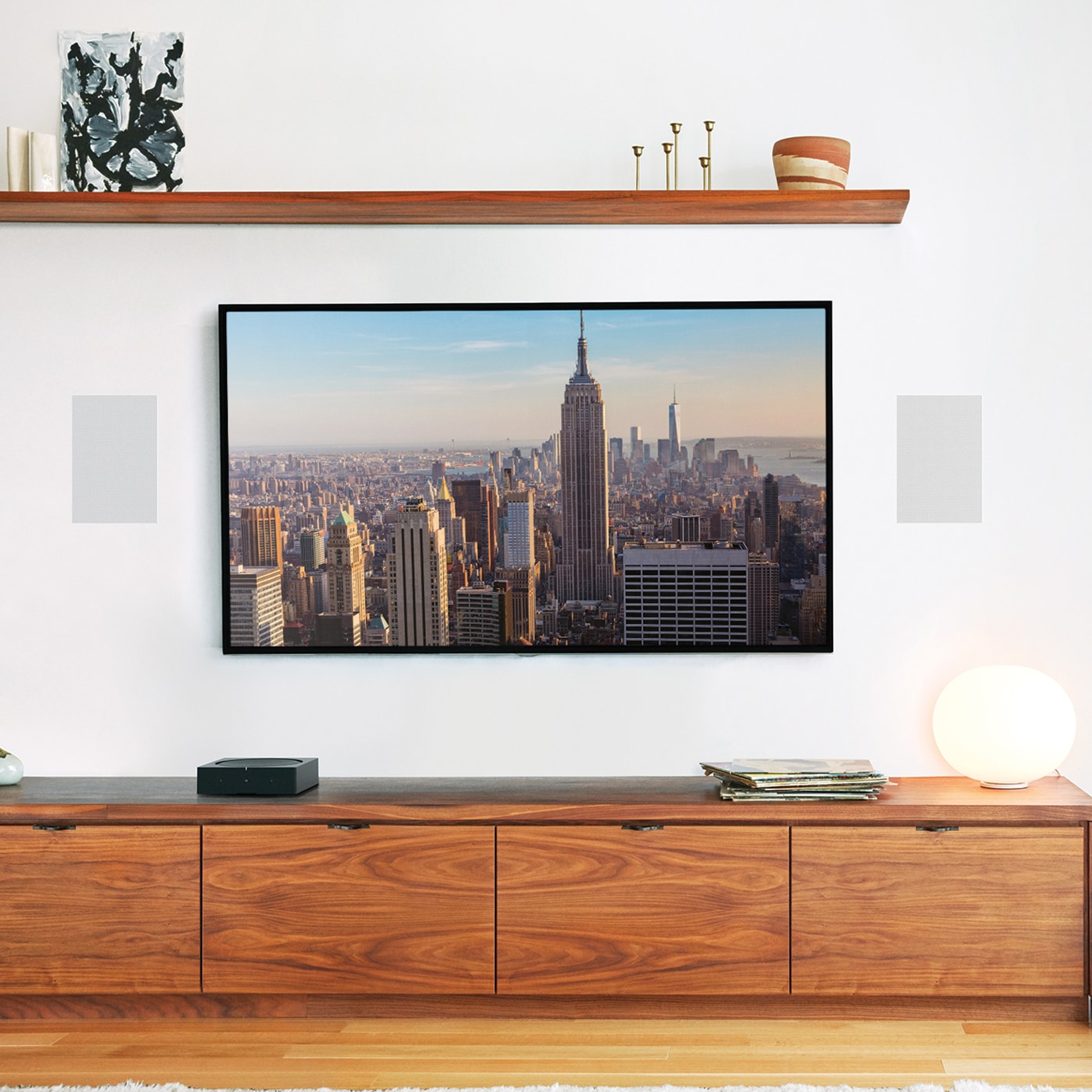 In-wall speakers by Sonos and Sonance installed next to a TV