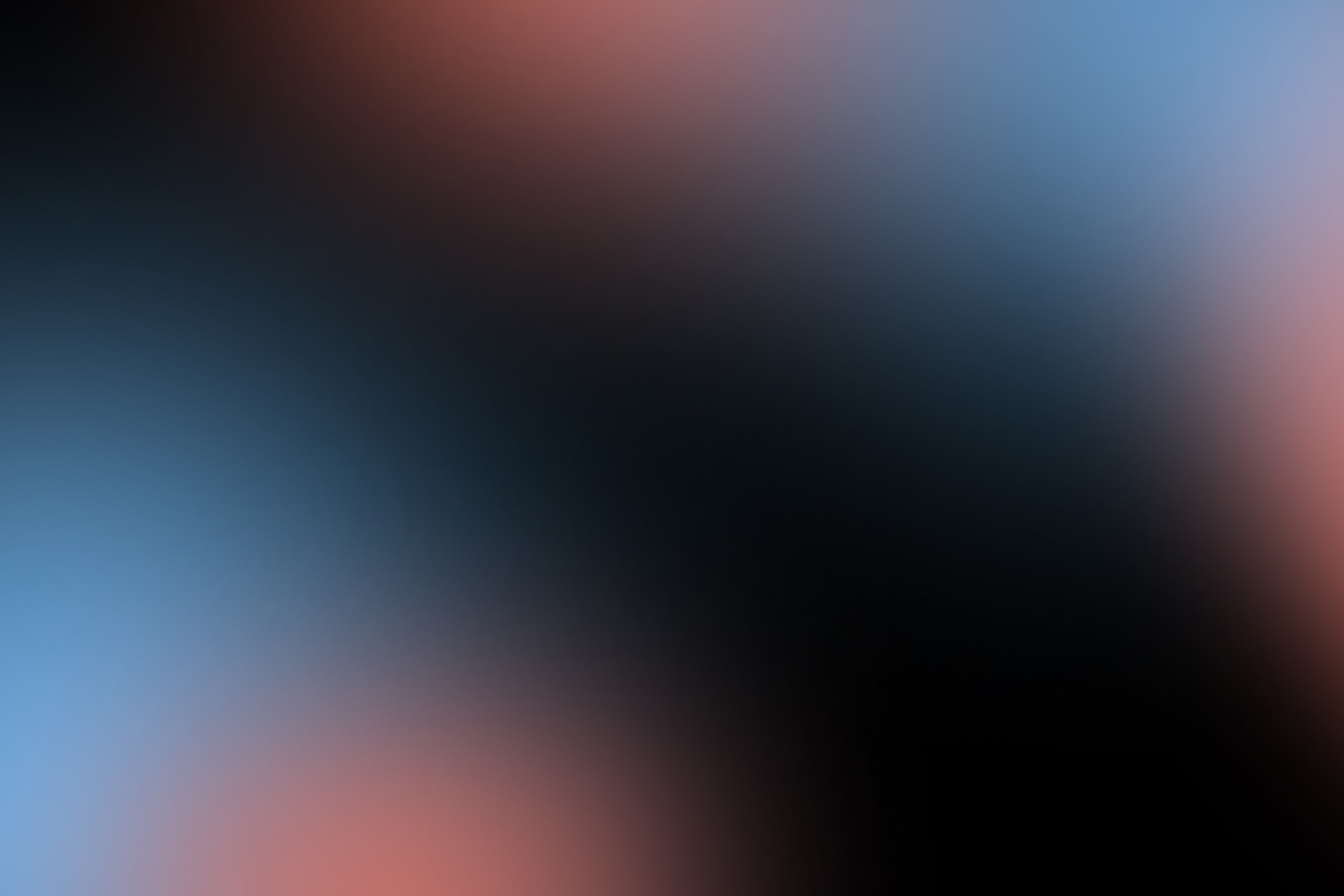 Blue and red colour gradient over a black background