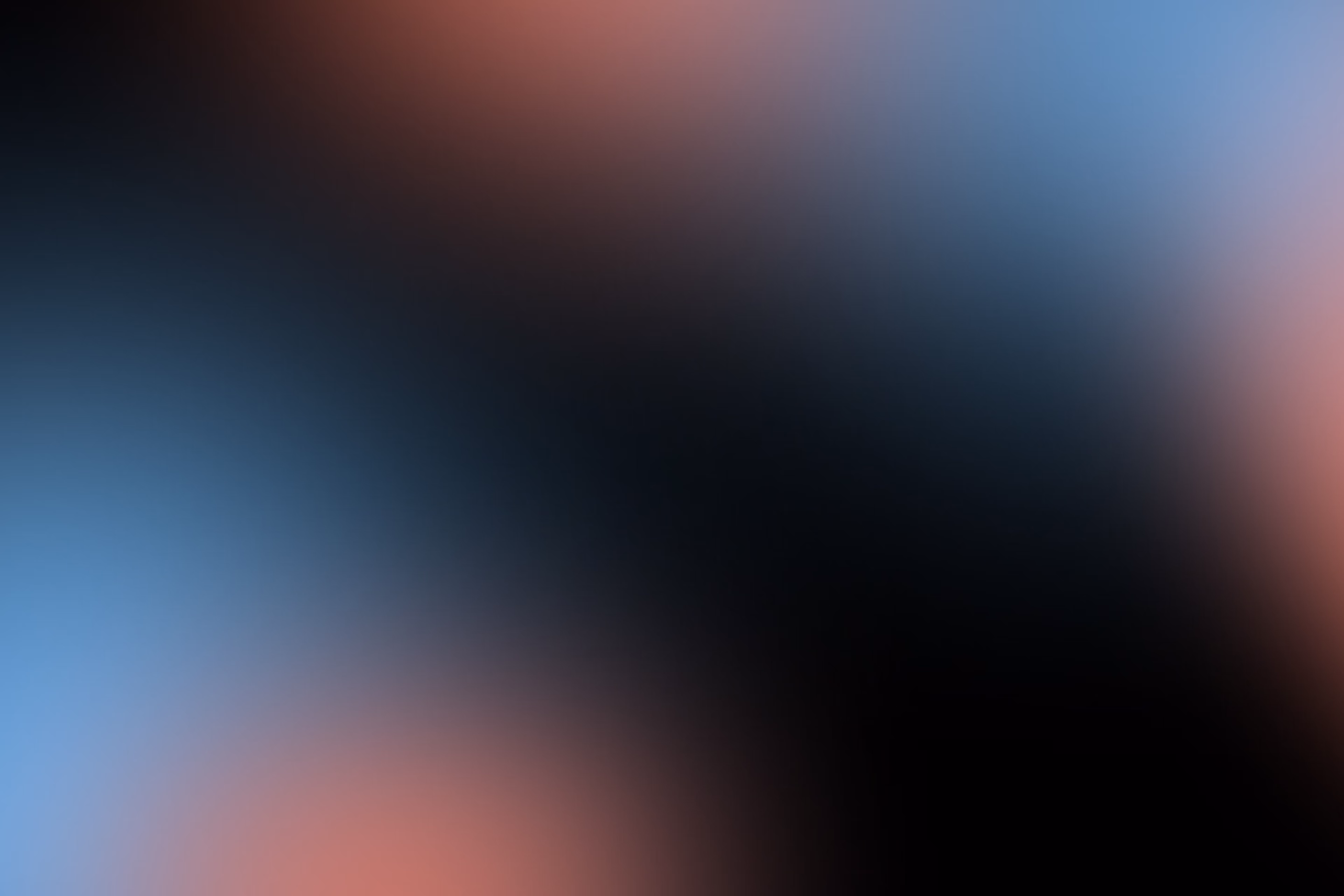 Blue and red colour gradient over a black background