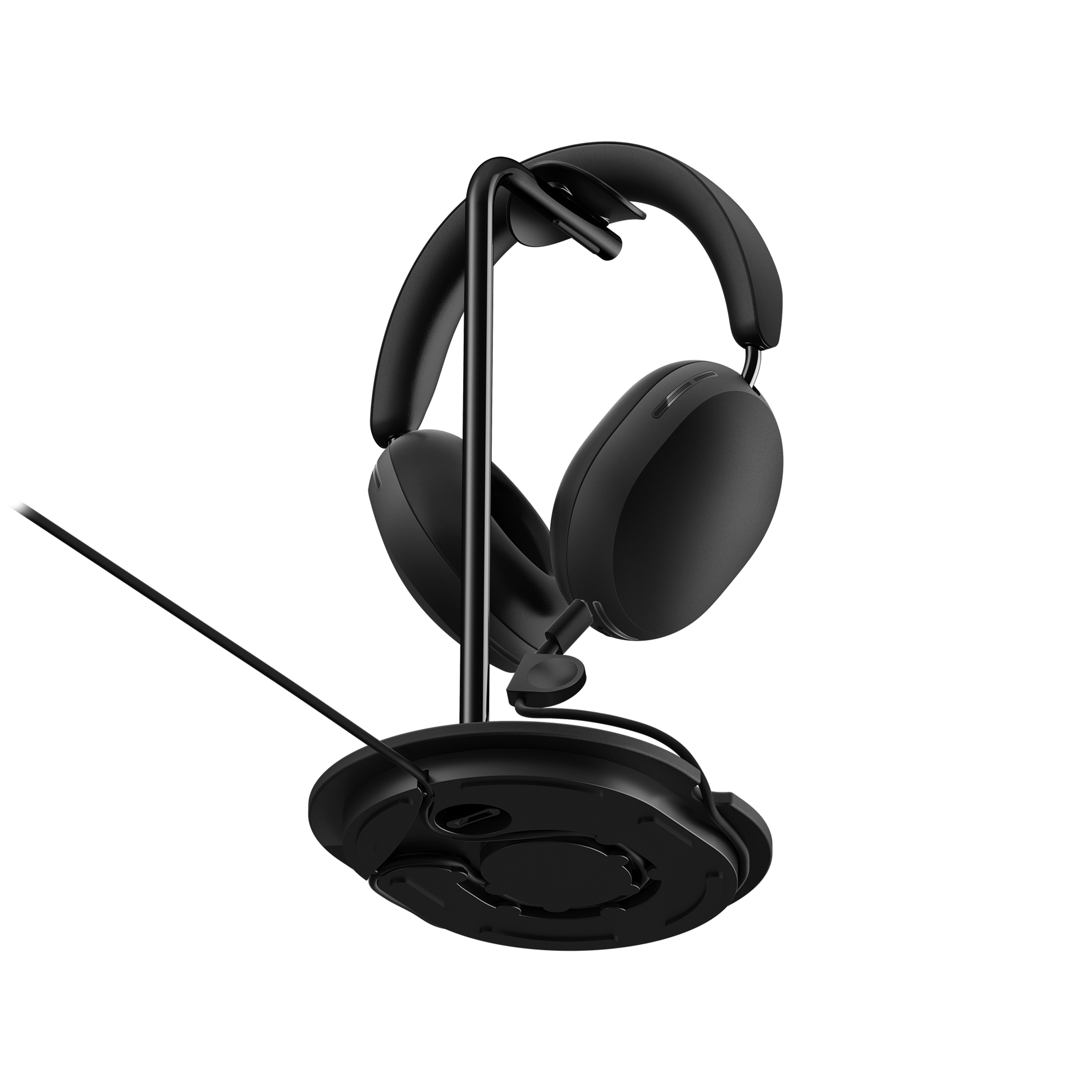 bottom view of black Sonos Ace headphones on Sanus Stand for Sonos Ace with cord showing