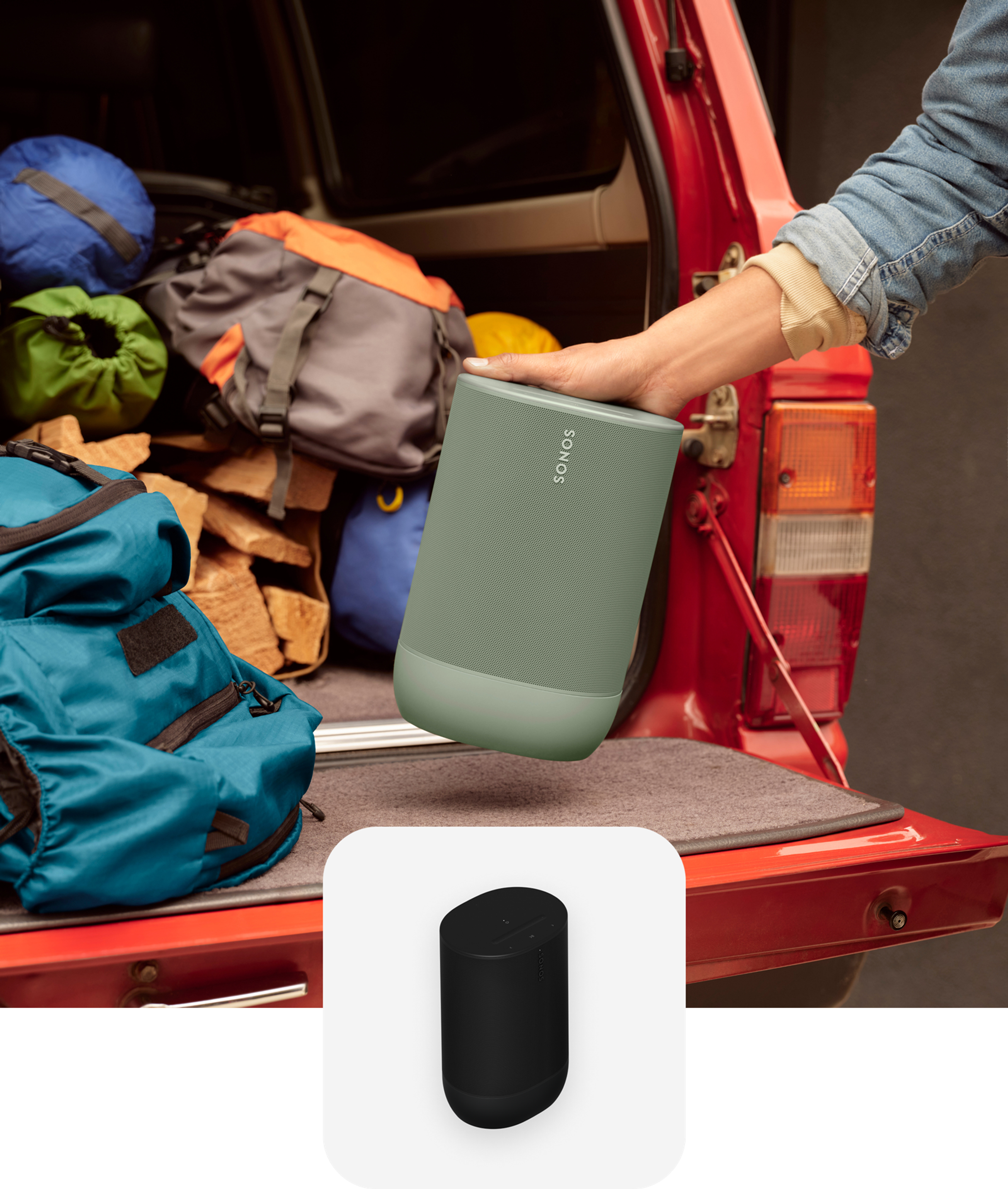User loading up an olive colored Move 2 in the back of a truck for a camping trip