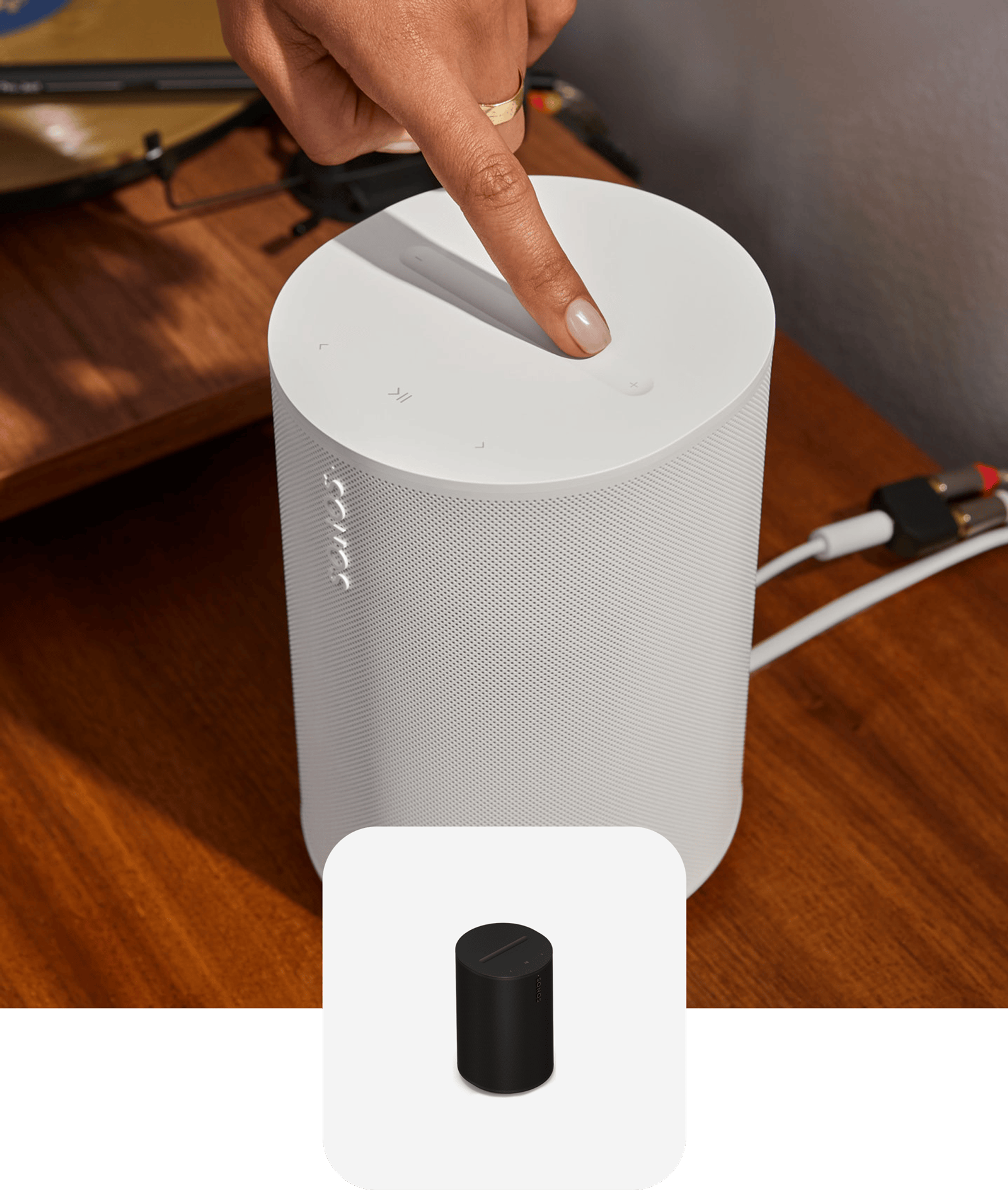 User tapping the volume slider on a white Sonos Era 100 SL speaker