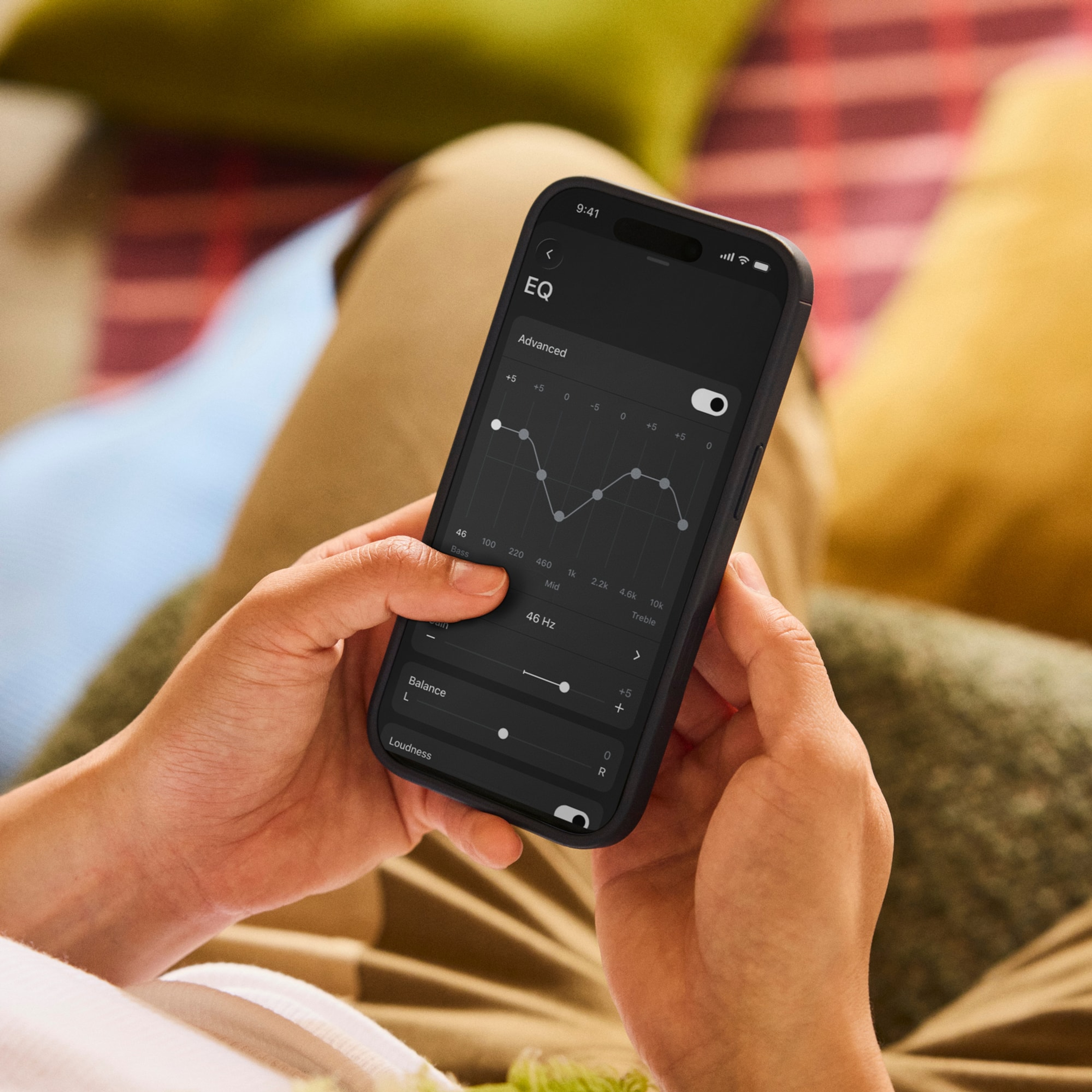 Person using the parametric EQ feature in the Sonos app